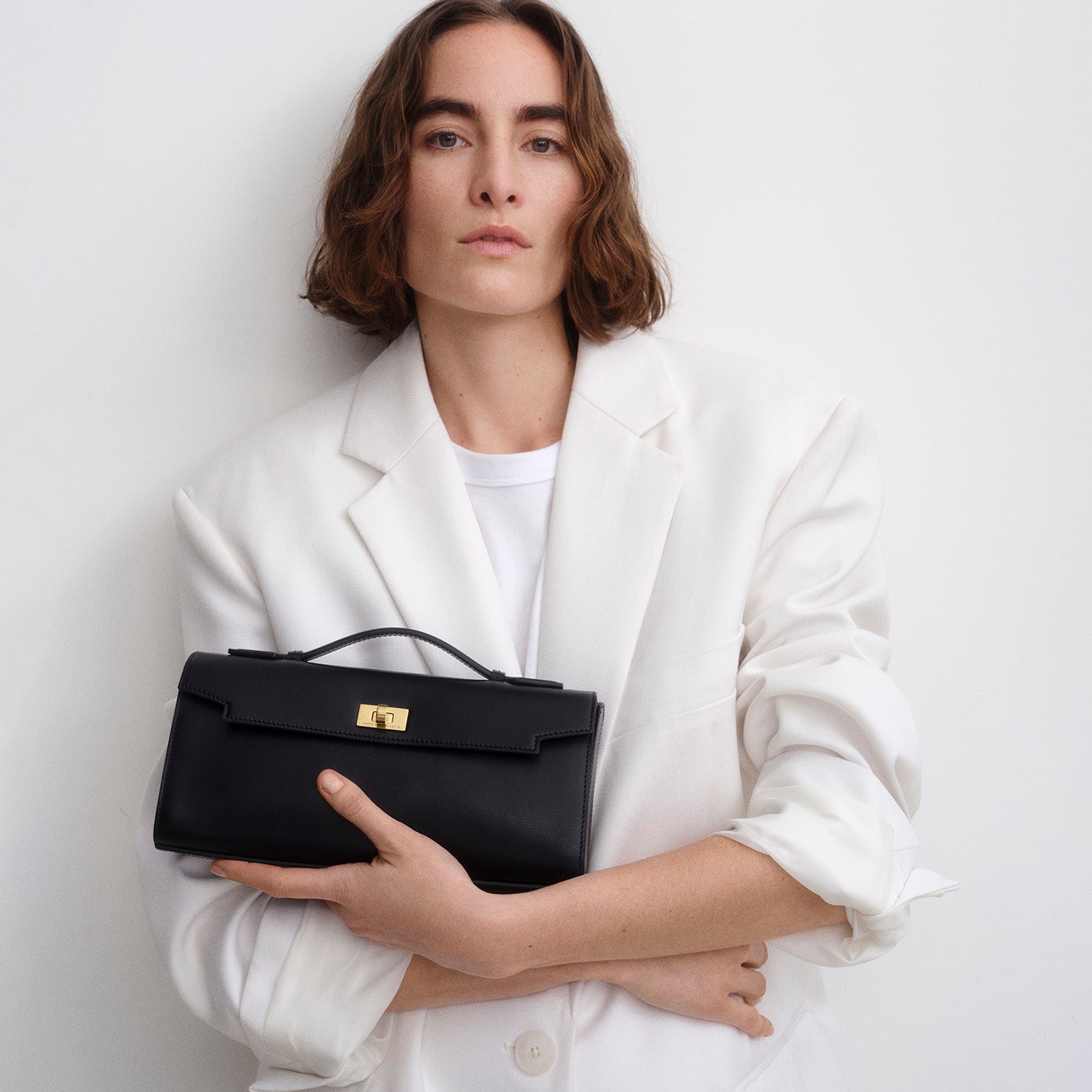 クラッチバッグ ANYA HINDMARCH MORTIMER LEATHER CLUTCH WITH SHOULDER STRAP Mortimer Clutch | Anya Hindmarch UK