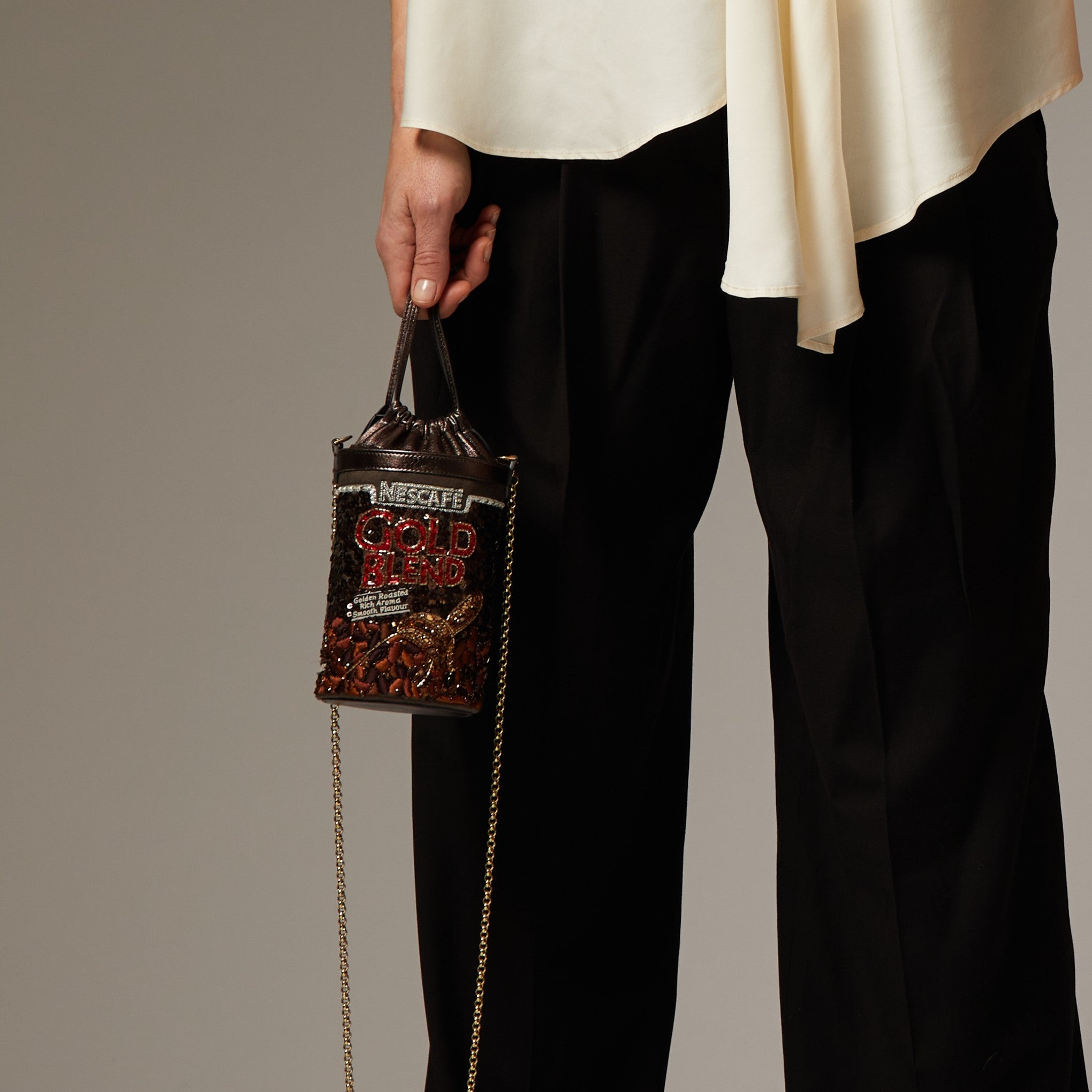 Anya Brands Gold Blend Mini Bucket Bag -

                  
                    Sequins in Chocolate -
                  

                  Anya Hindmarch UK

