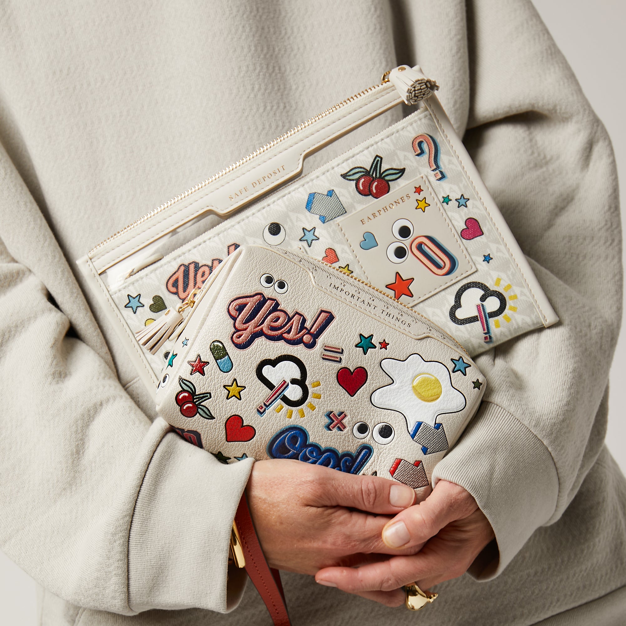 All Over Stickers Safe Deposit Case -

                  
                    Recycled Canvas in Chalk -
                  

                  Anya Hindmarch UK
