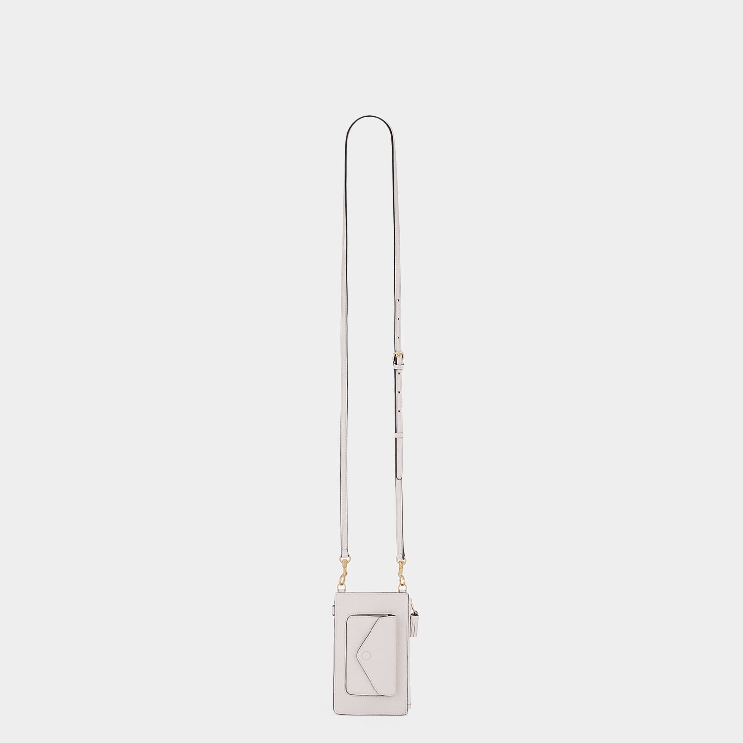 Anya Brands Corn Flakes Zip Phone Pouch on Strap -

                  
                    Shiny Capra Leather in Chalk -
                  

                  Anya Hindmarch UK
