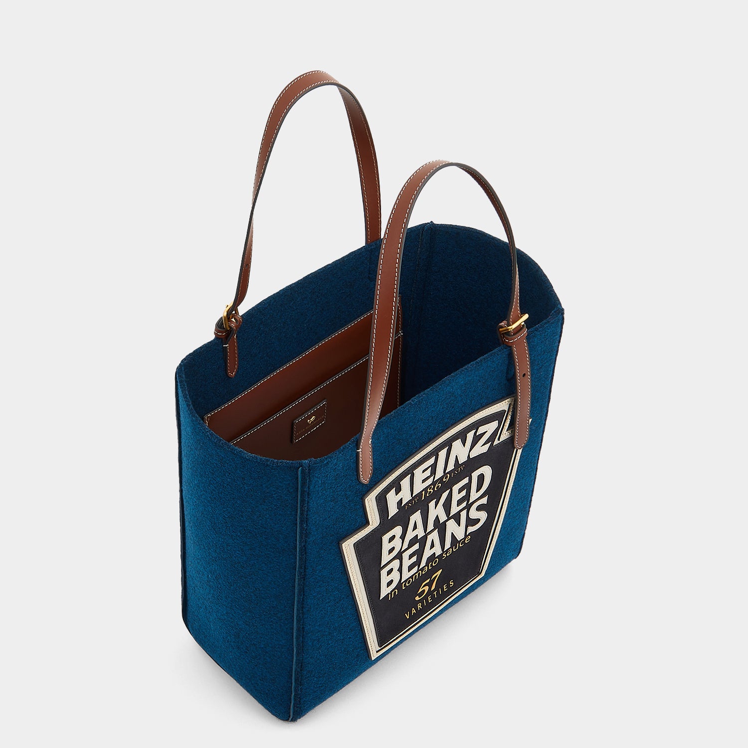Anya Brands Heinz Baked Beans Small Tote -

                  
                    Recycled Felt in Teal -
                  

                  Anya Hindmarch UK
