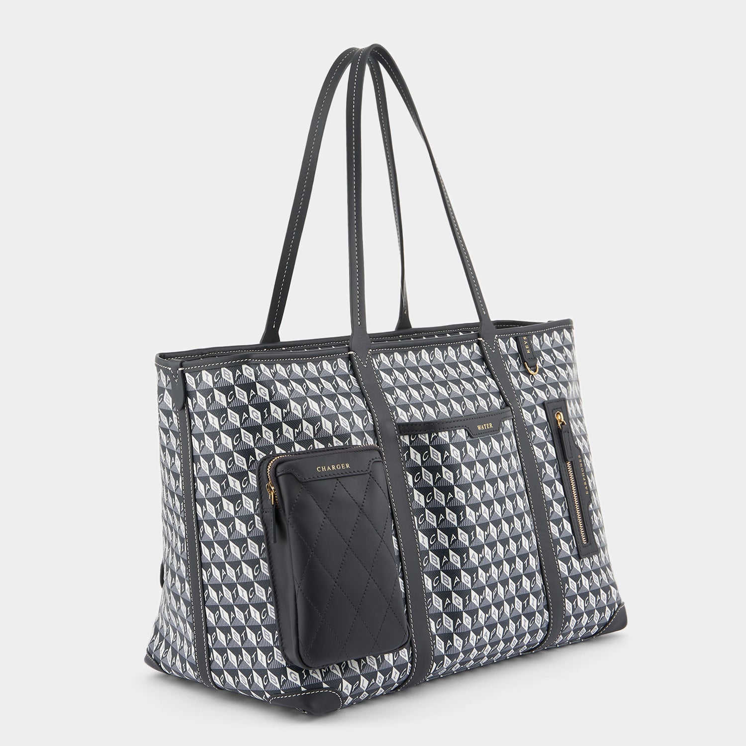 I am a Plastic Bag In-Flight Tote -

                  
                    Recycled Canvas in Charcoal -
                  

                  Anya Hindmarch UK
