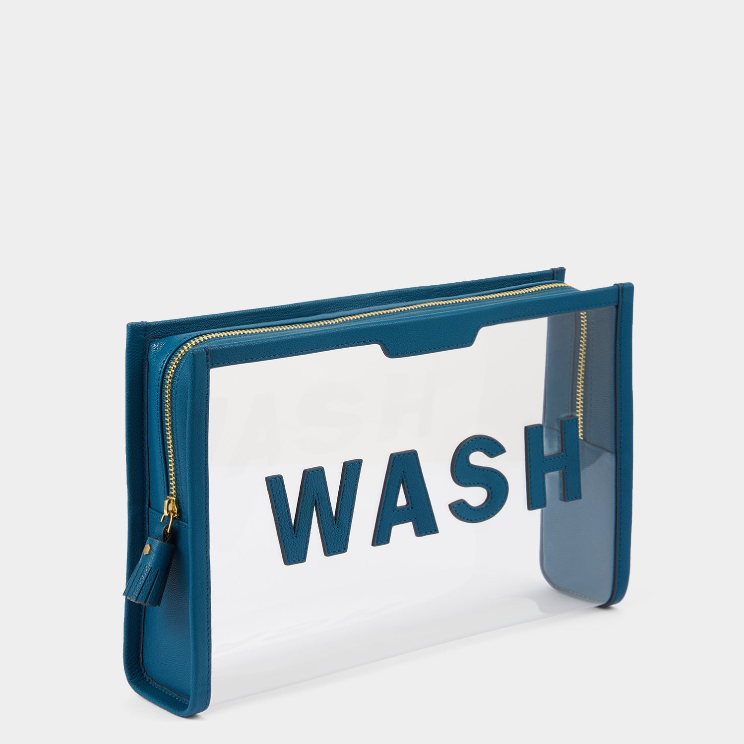 Wash Pouch -

                  
                    Capra in Clear/Light Petrol -
                  

                  Anya Hindmarch UK
