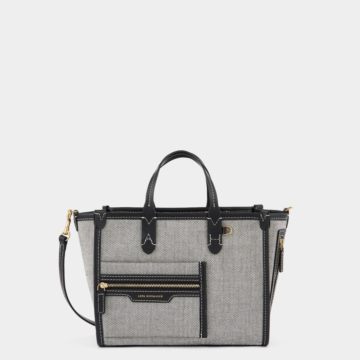 Pocket XS Tote -

                  
                    Mixed Canvas in Salt And Pepper -
                  

                  Anya Hindmarch UK
