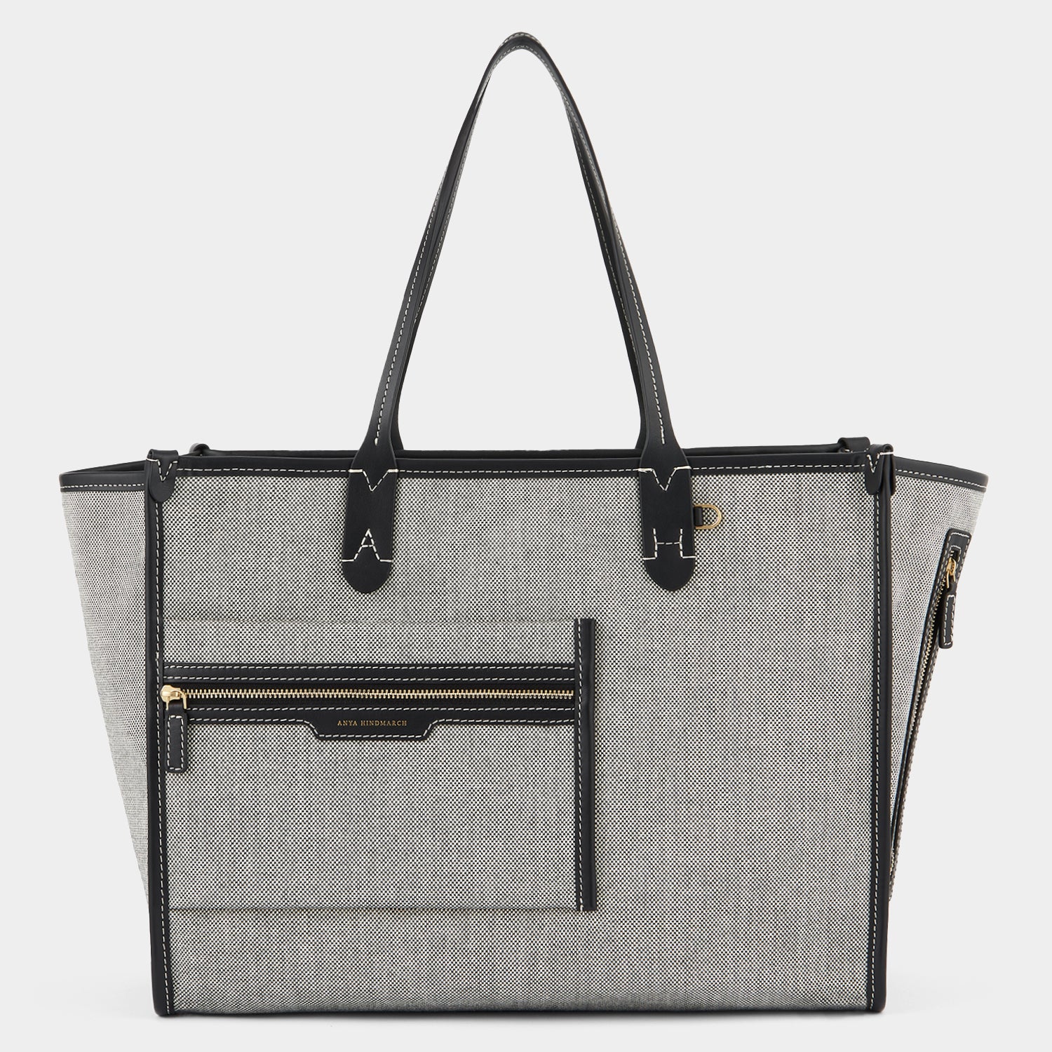 Pocket Tote -

                  
                    Mixed Canvas in Salt And Pepper -
                  

                  Anya Hindmarch UK
