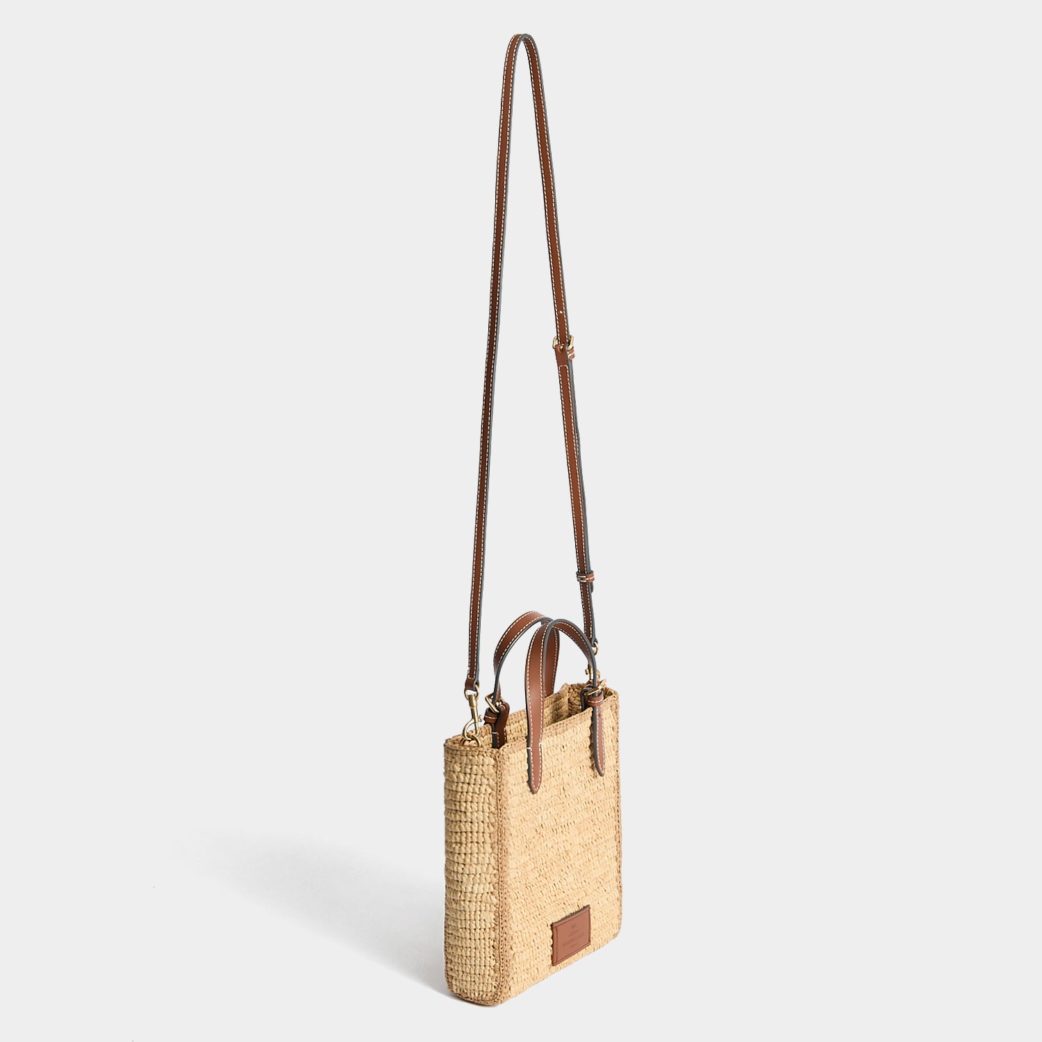 Mini Raffia Cross-body Tote Bag with Eyes | Anya Hindmarch UK