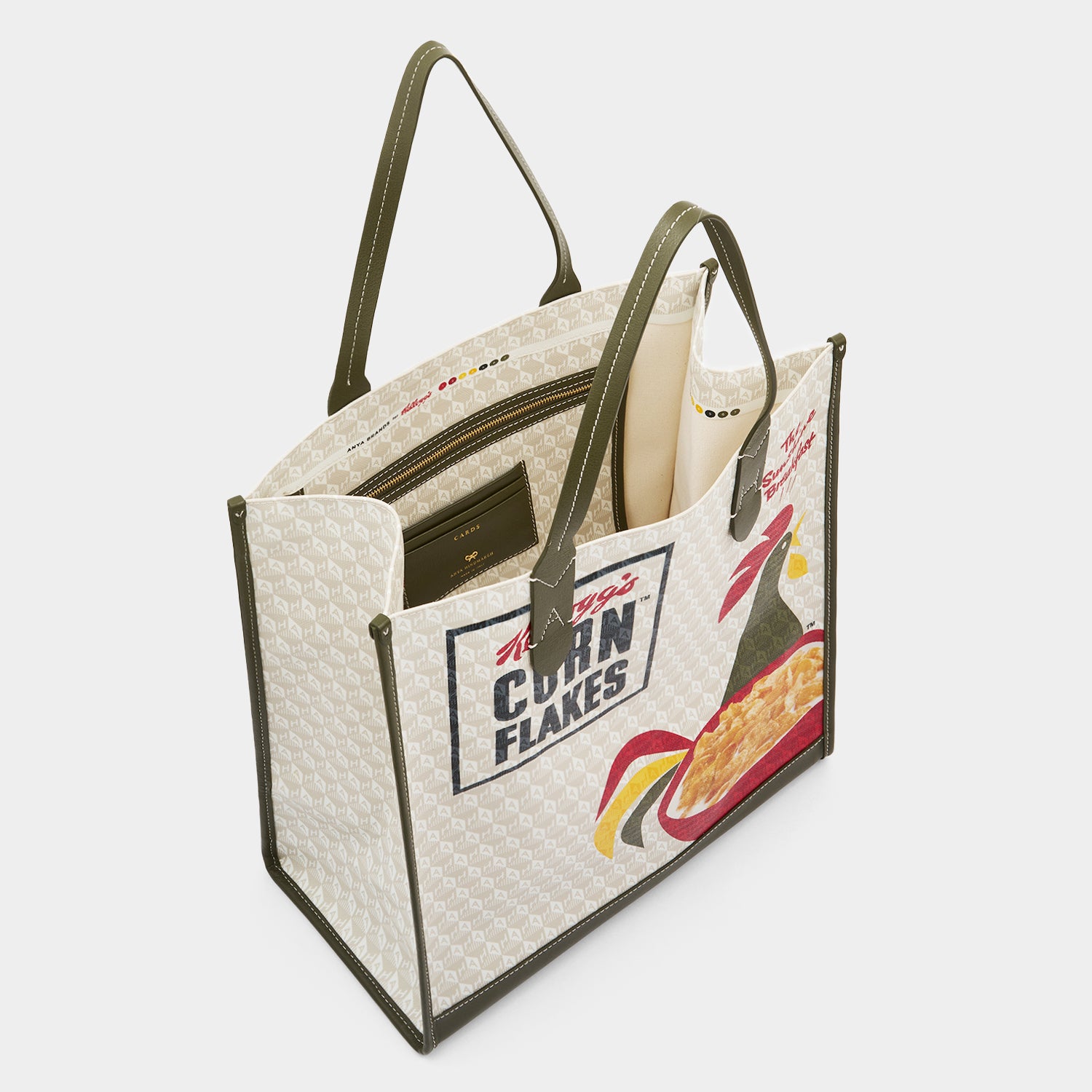Anya Brands Corn Flakes Tote -

                  
                    Recycled Canvas in Chalk -
                  

                  Anya Hindmarch UK
