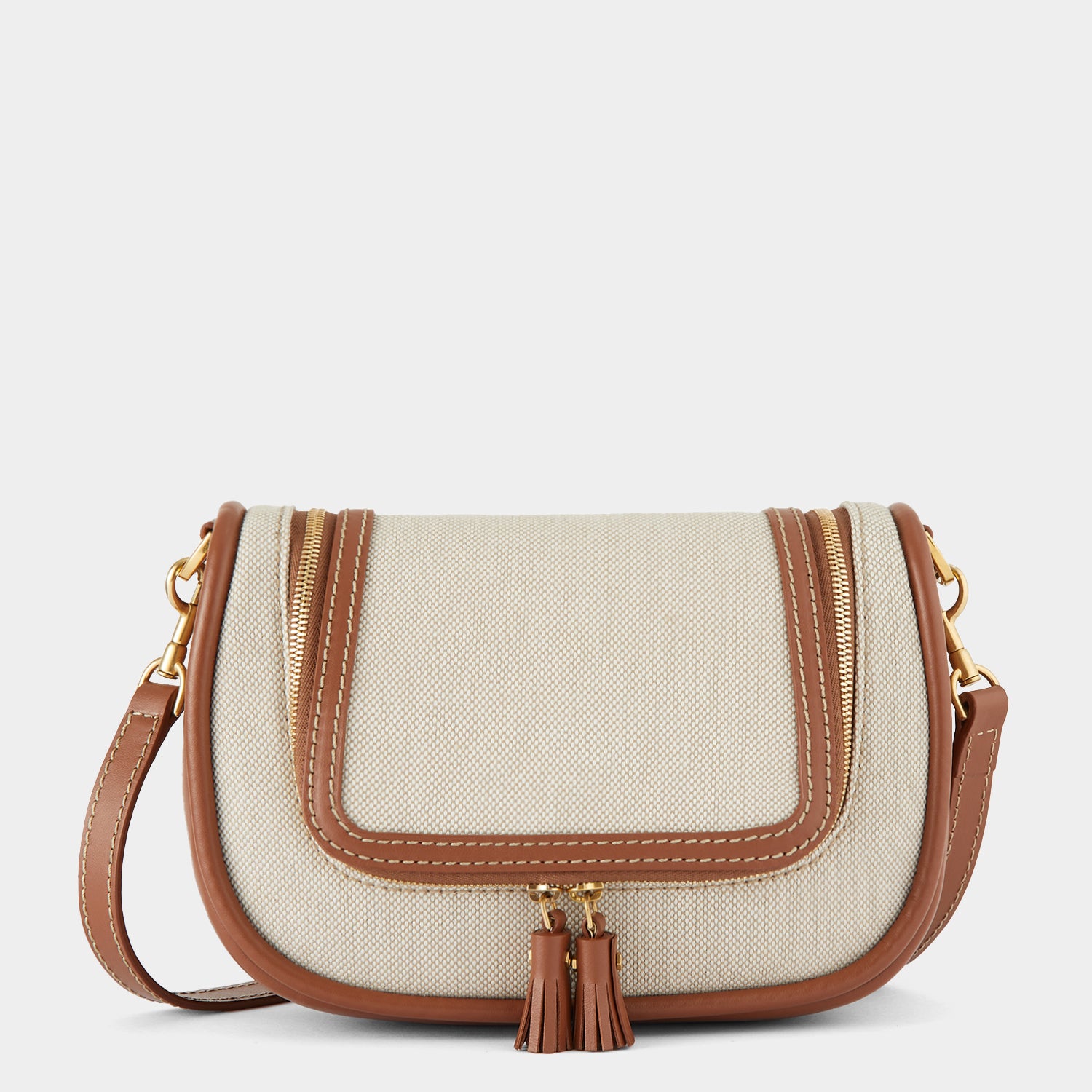 Vere Small Soft Satchel Cross-body -

                  
                    Mixed Canvas in Natural -
                  

                  Anya Hindmarch UK

