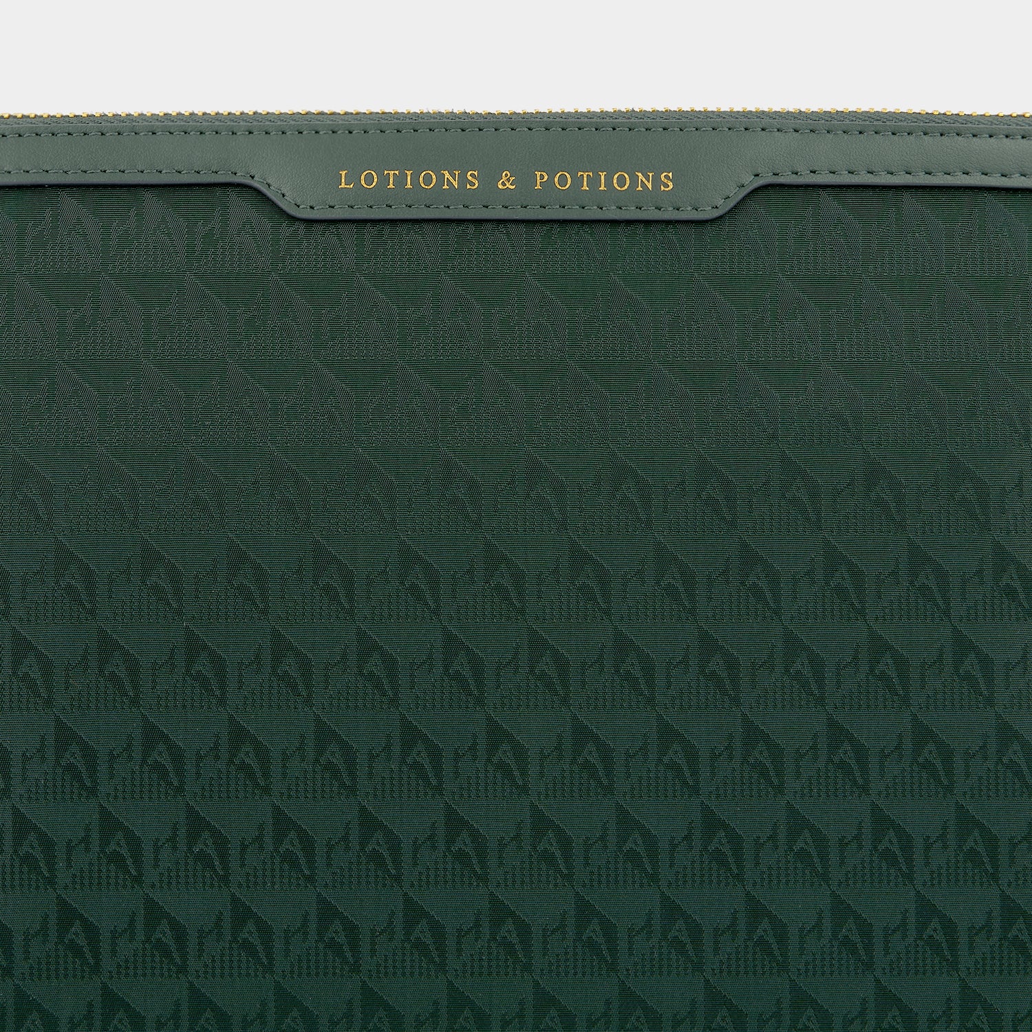 Logo Lotions and Potions Pouch -

                  
                    Jacquard Nylon in Dark Holly -
                  

                  Anya Hindmarch UK
