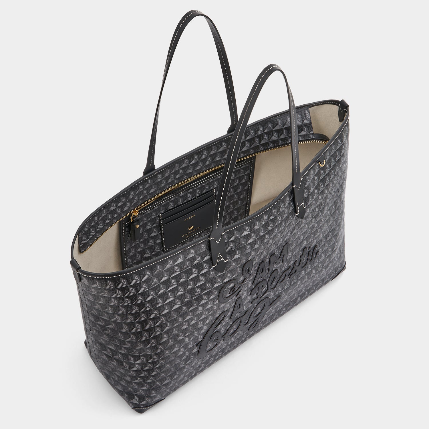 ANYA HINDMARCH「I Am A Plastic Bag」ジップ付きトートバッグ I Am A Plastic Bag XS Zipped Motif Cross-body Tote | Anya