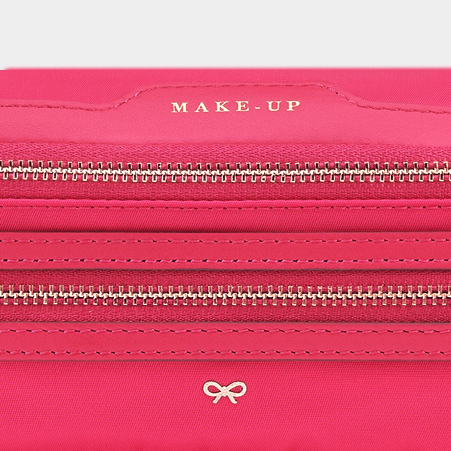 Make-Up Pouch -

                  
                    Econyl® Regenerated Nylon in Hot Pink -
                  

                  Anya Hindmarch UK
