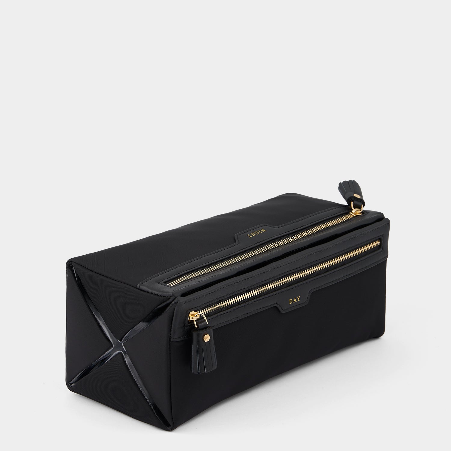 Night and Day Pouch -

                  
                    Econyl® Regenerated Nylon in Black -
                  

                  Anya Hindmarch UK
