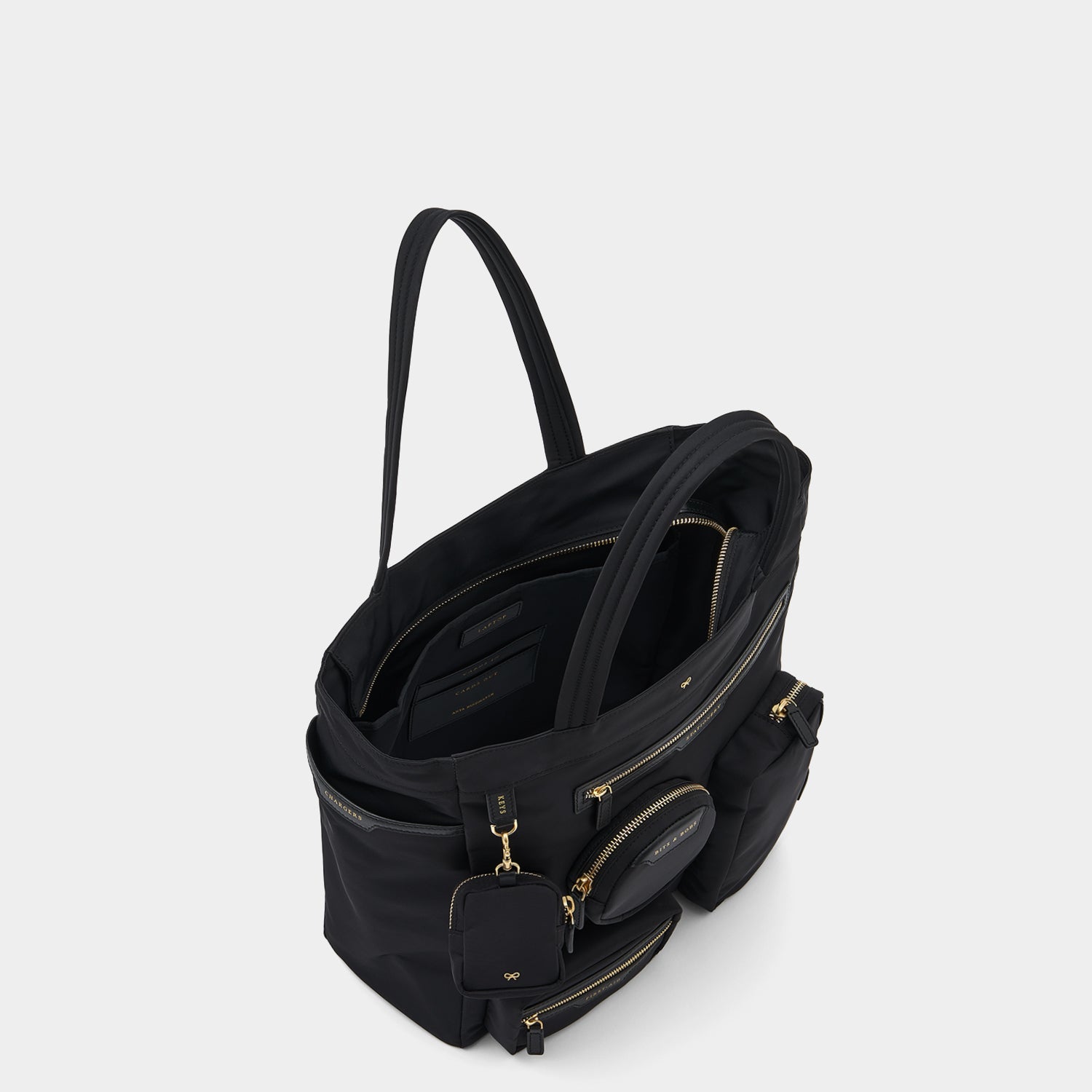 Commuter Tote -

                  
                    Regenerated Econyl® in Black -
                  

                  Anya Hindmarch UK
