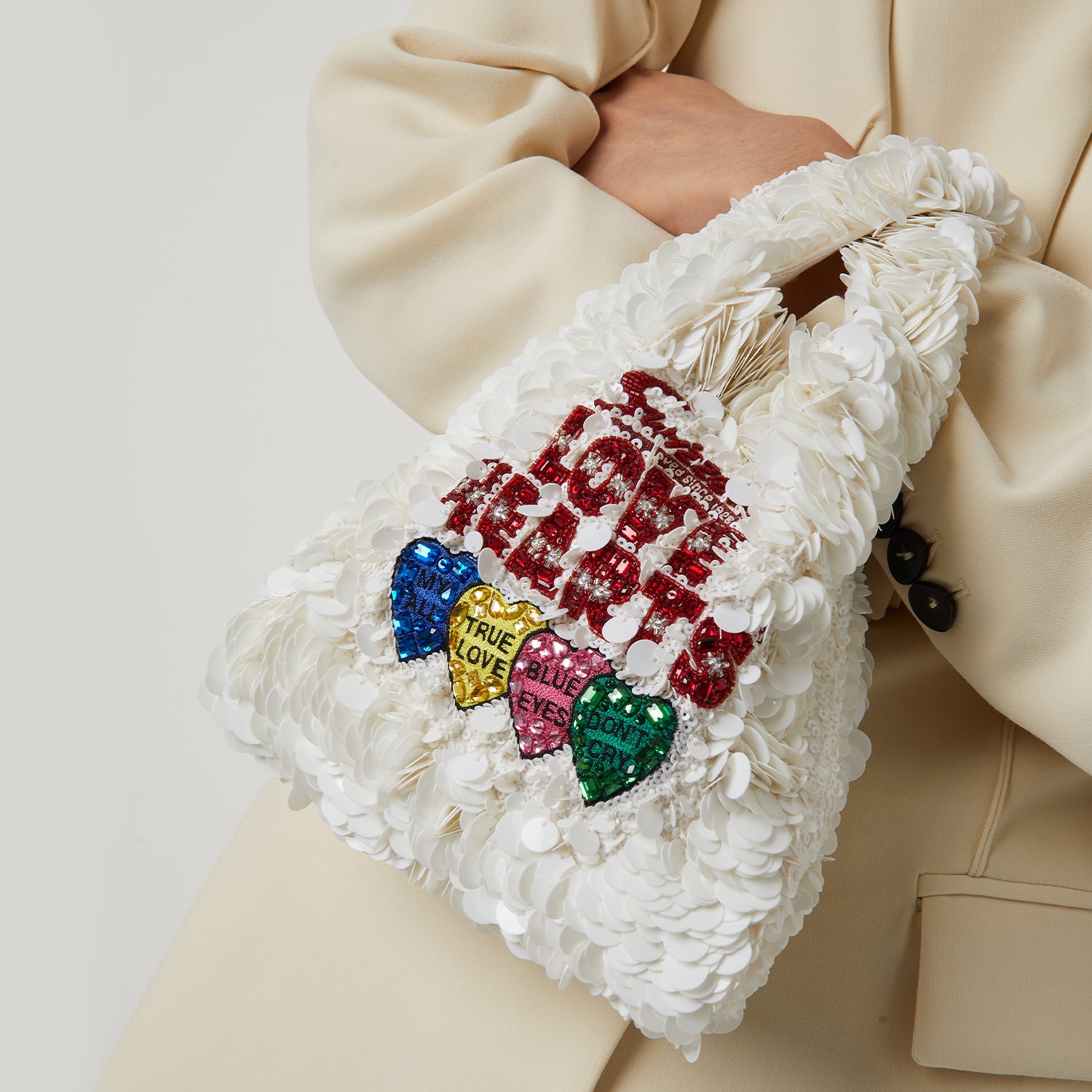 Anya Brands Love Hearts Mini Tote -

                  
                    Sequins in Optic White -
                  

                  Anya Hindmarch UK
