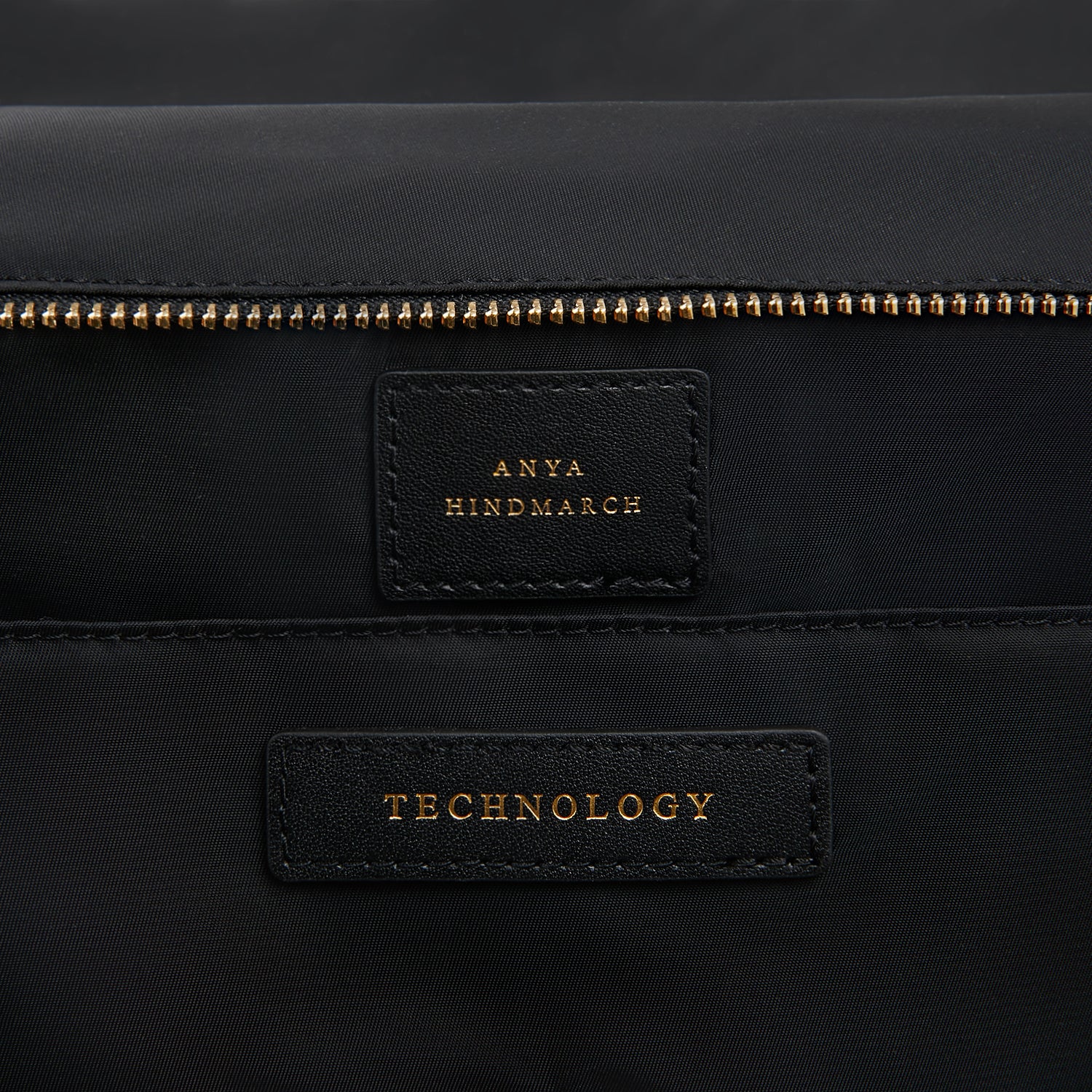 24 Hour Travel Bag -

                  
                    Econyl® Regenerated Nylon in Black -
                  

                  Anya Hindmarch UK
