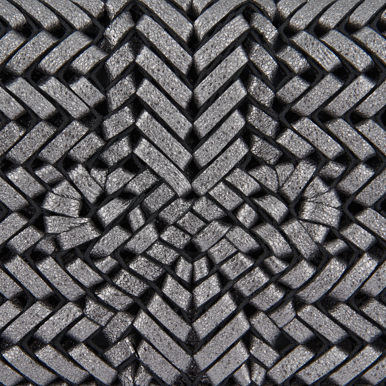 Neeson Tassel Clutch -

                  
                    Metallic Leather in Anthracite -
                  

                  Anya Hindmarch UK
