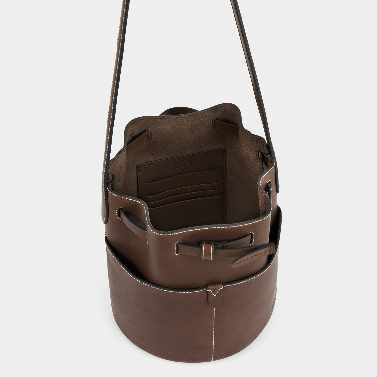 Return to Nature Small Bucket Bag -

                  
                    Compostable Leather in Truffle -
                  

                  Anya Hindmarch UK
