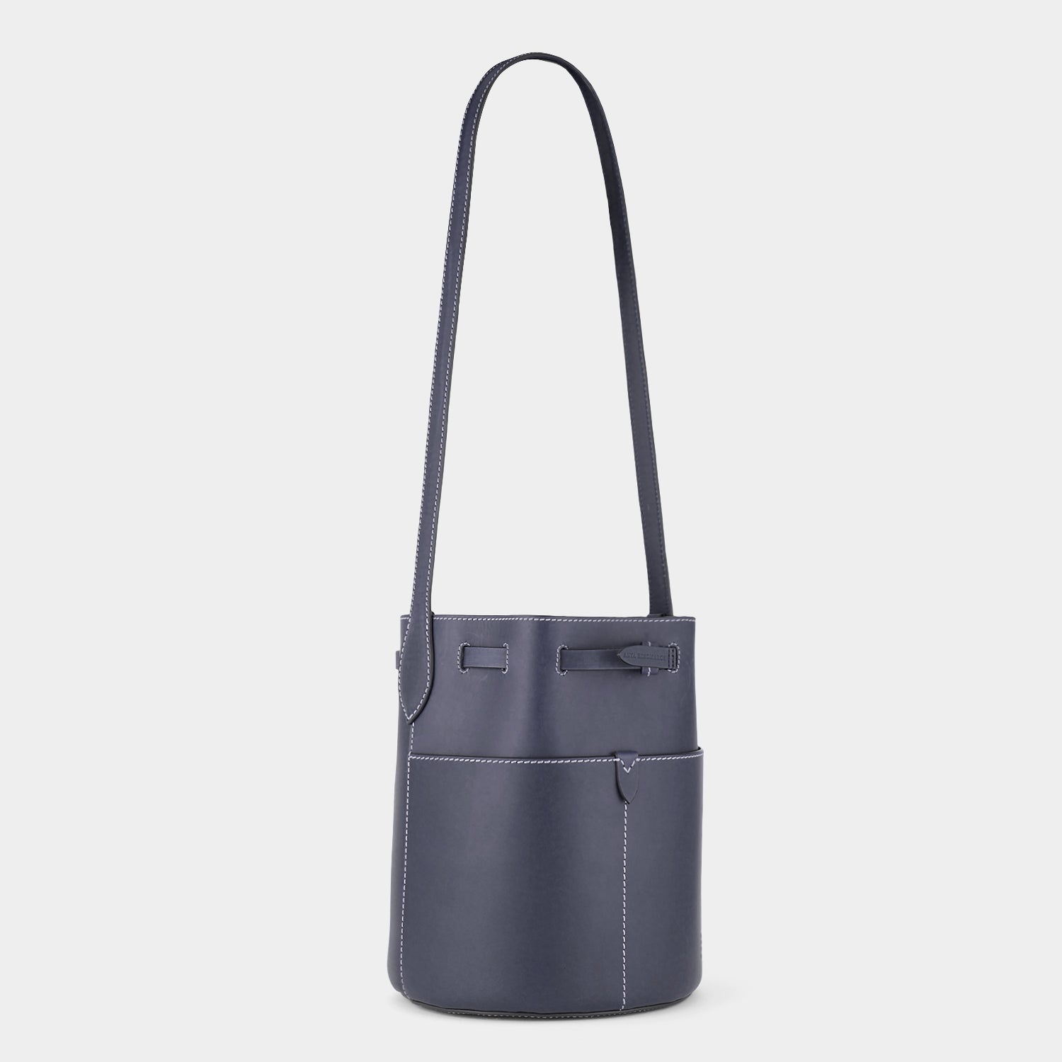 Return to Nature Small Bucket Bag -

                  
                    Compostable Leather in Marine -
                  

                  Anya Hindmarch UK
