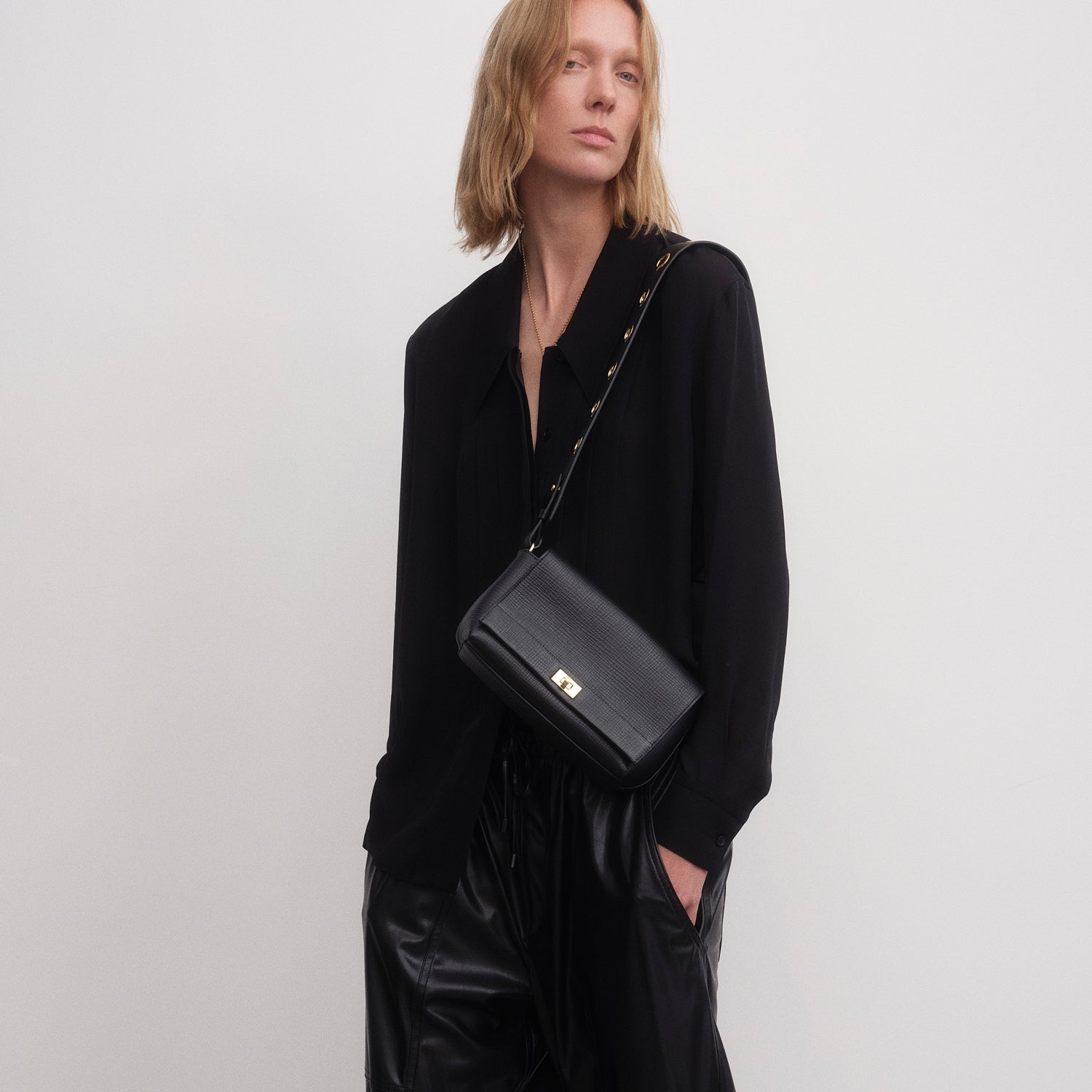 Mortimer Eyelet Cross-body -

          
            Crosshatch Leather in Black -
          

          Anya Hindmarch UK
