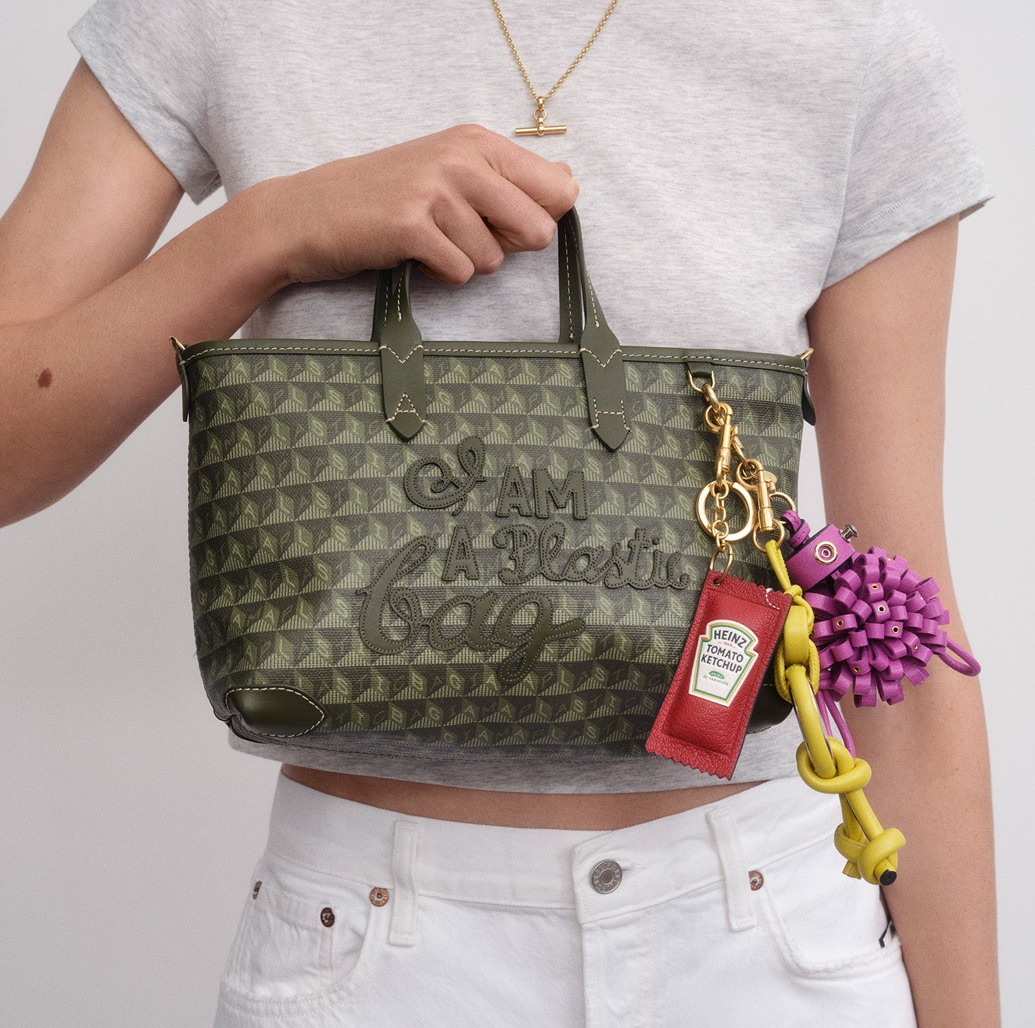 I Am A Plastic Bag XS Zipped Motif Cross-body Tote -

          
            Recycled Canvas in Fern -
          

          Anya Hindmarch UK
