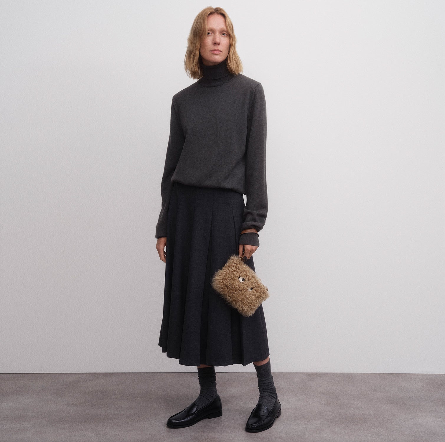 Shearling Eyes Clutch -

          
            Shearling/Smooth Leather leather in Taupe -
          

          Anya Hindmarch UK
