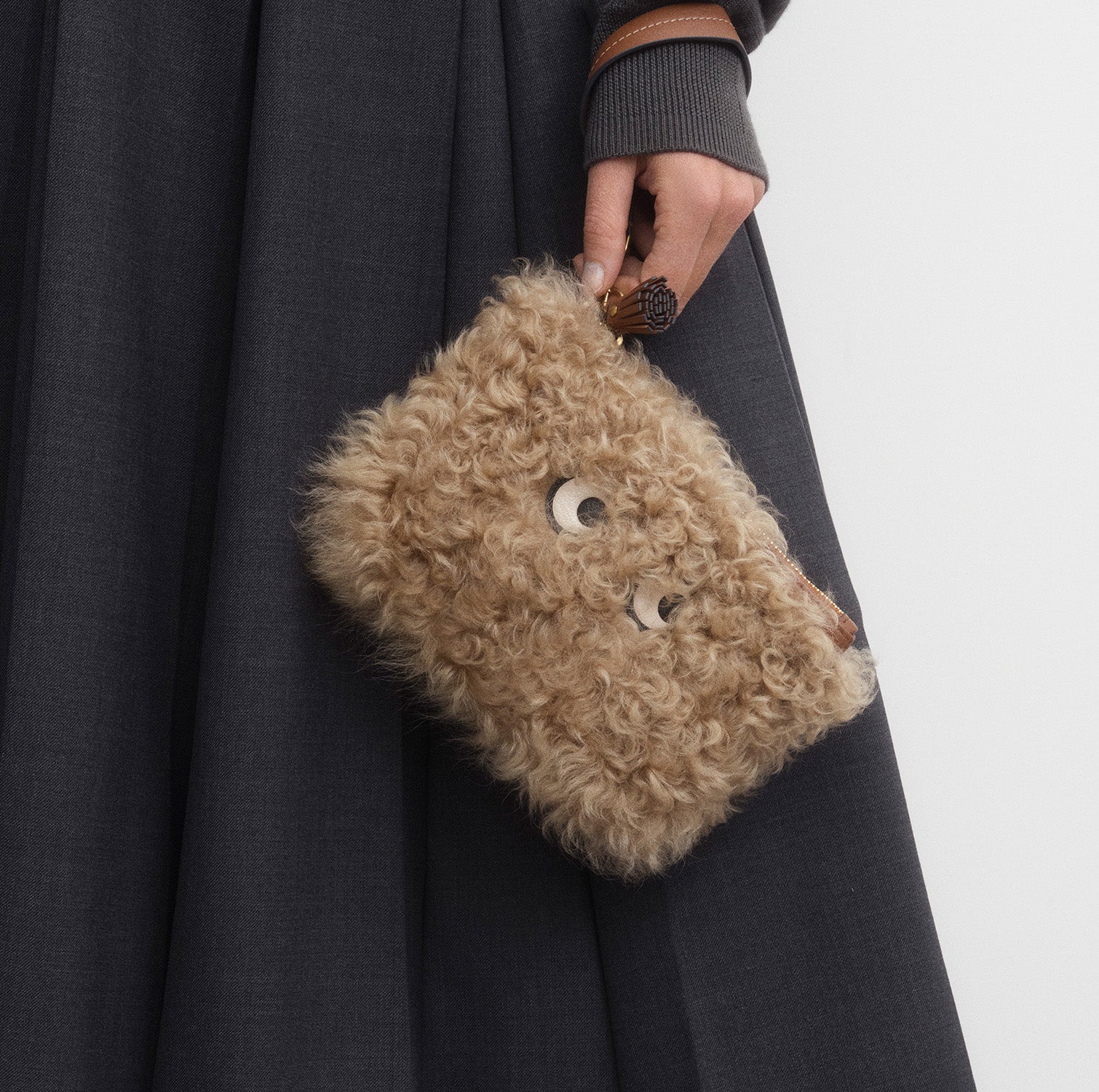 Shearling Eyes Clutch -

          
            Shearling/Smooth Leather leather in Taupe -
          

          Anya Hindmarch UK
