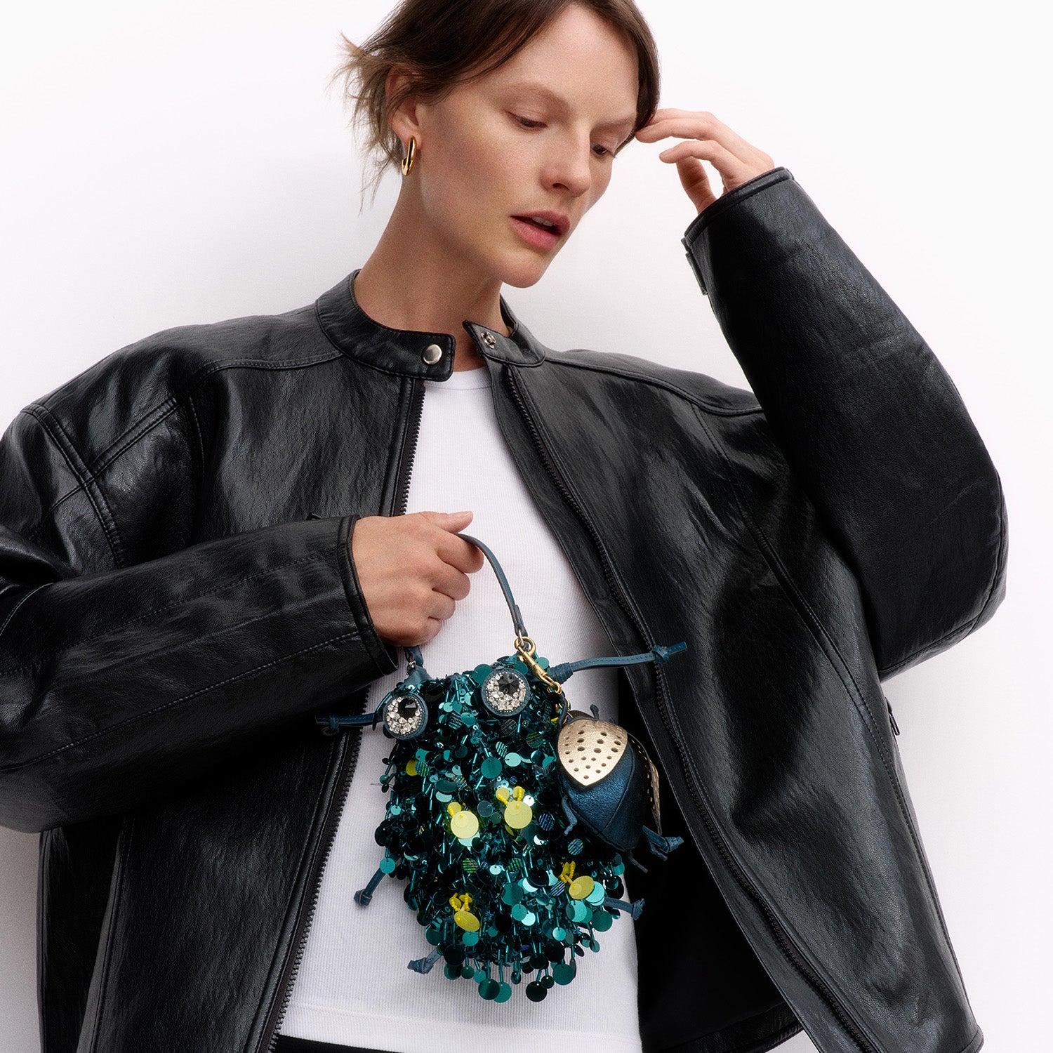 Beetle Sequins Cross-body -

          
            Sequins in Dark Teal green -
          

          Anya Hindmarch UK
