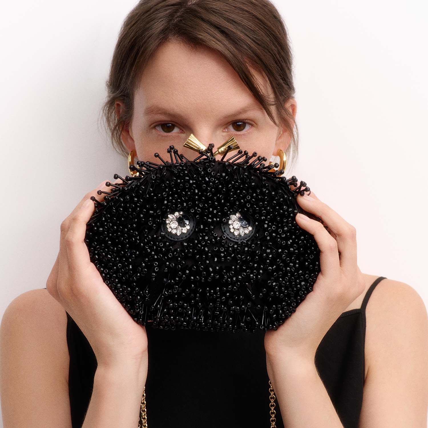 Embellished Eyes Clutch -

          
            Beads in Black -
          

          Anya Hindmarch UK
