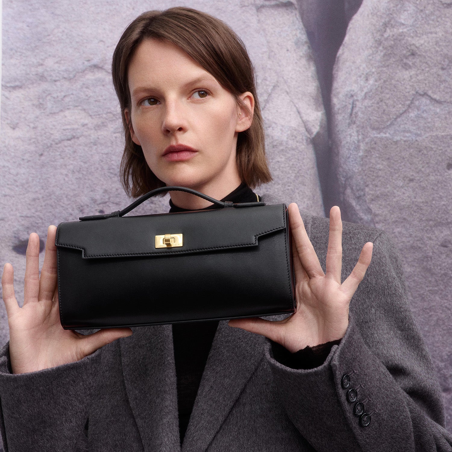 Mortimer Clutch -

          
            Calf Leather in Black -
          

          Anya Hindmarch UK
