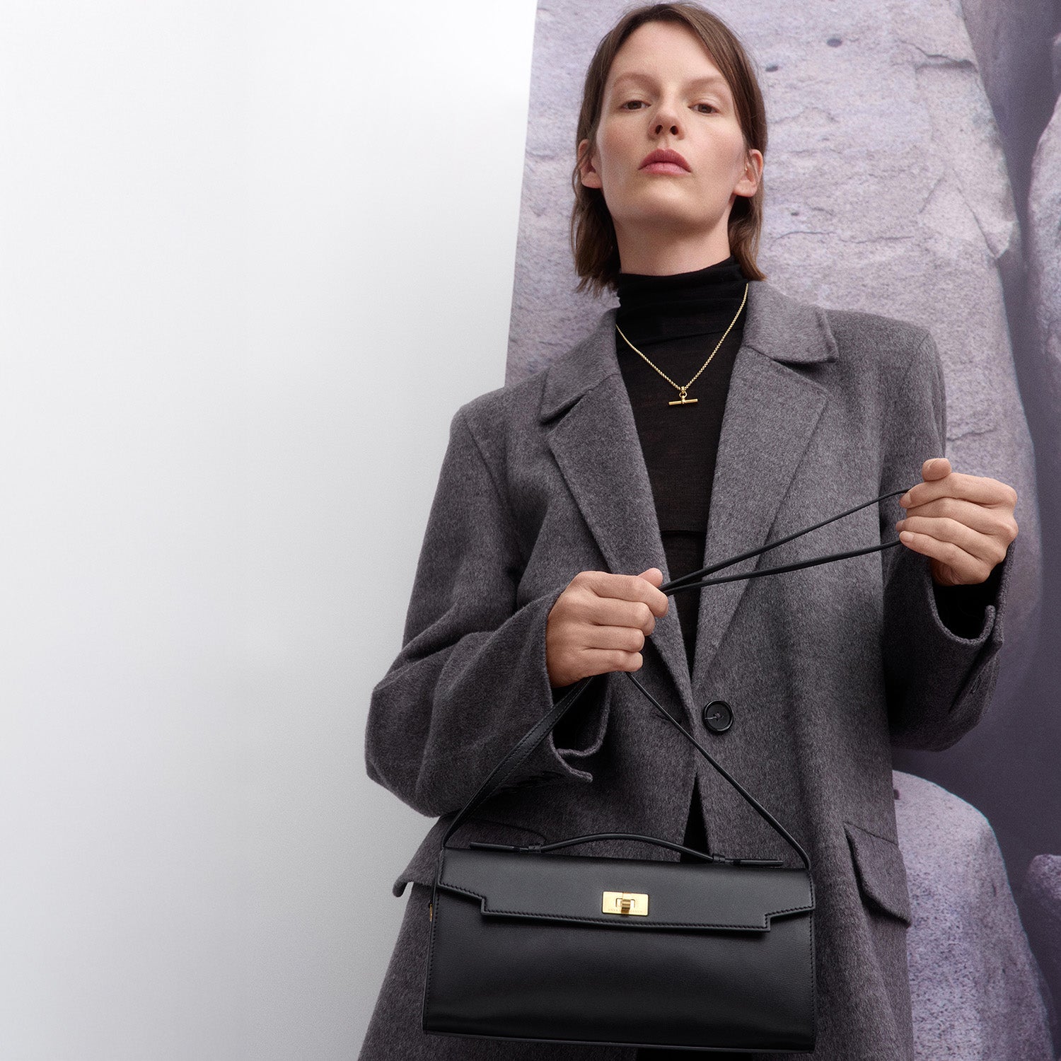 Mortimer Clutch -

          
            Calf Leather in Black -
          

          Anya Hindmarch UK
