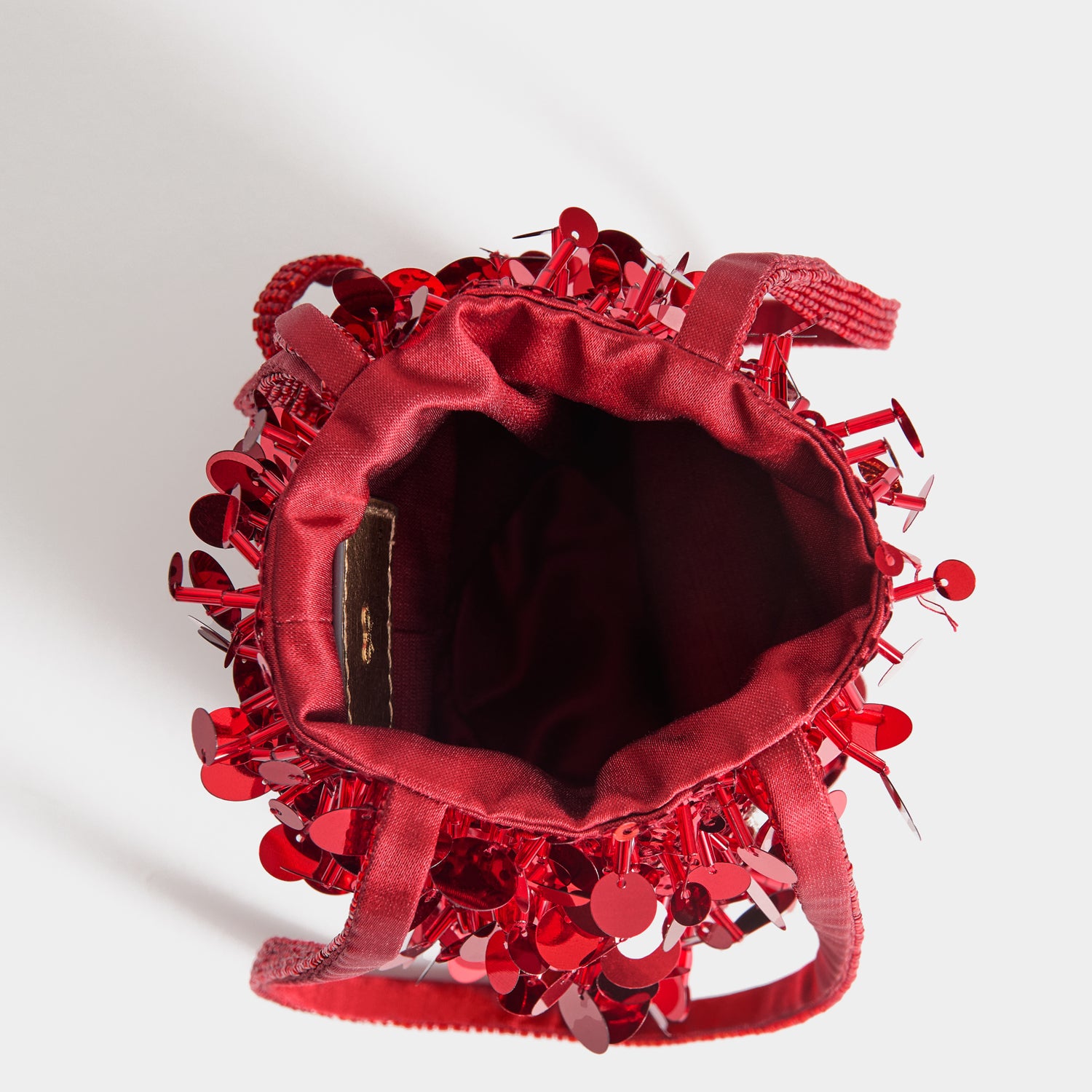 Anya Brands Imperial Leather Mini Bucket Bag -

          
            Satin/Sequins in Red -
          

          Anya Hindmarch UK
