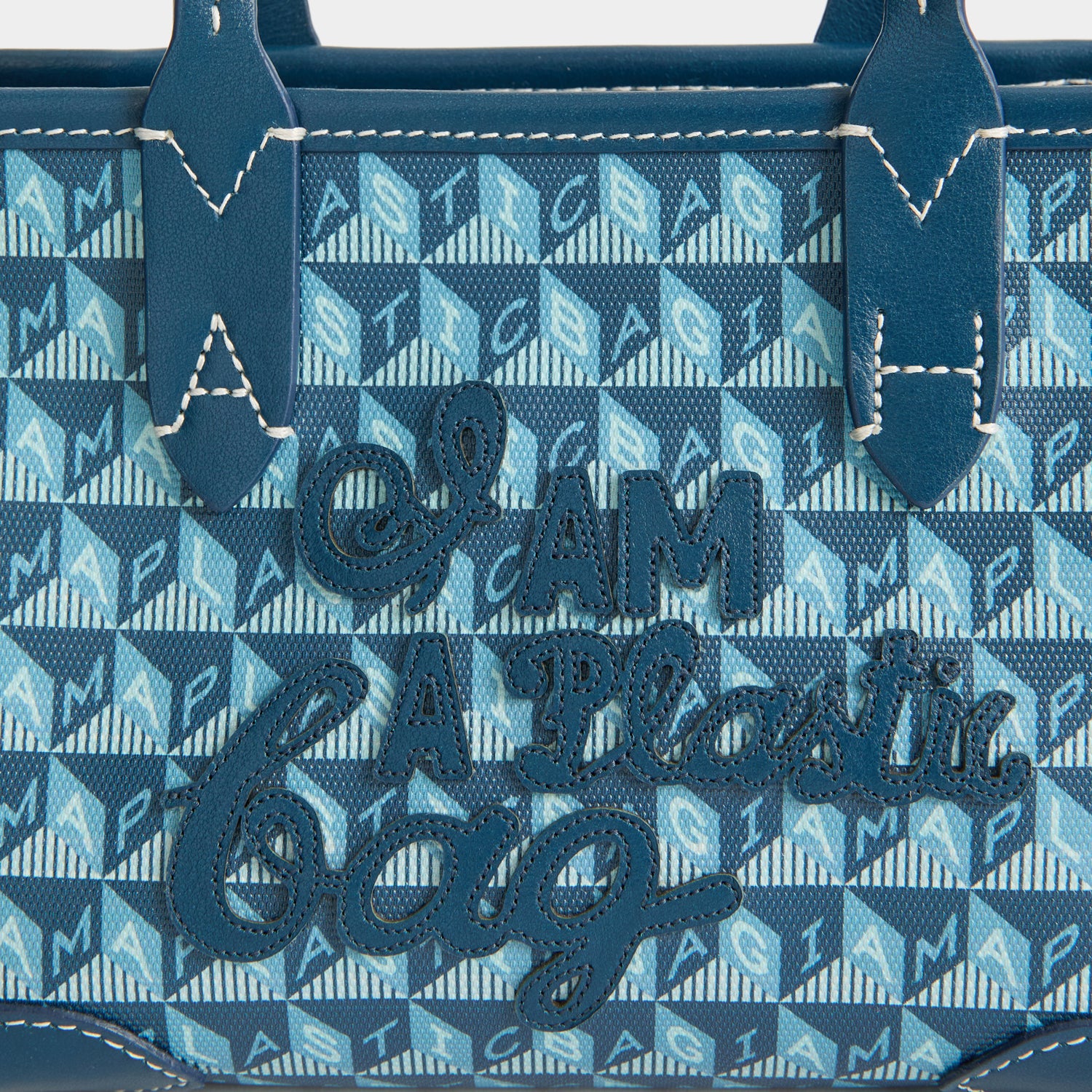 I Am A Plastic Bag Mini Tote -

          
            Recycled canvas/Satin leather in Petrol Blue -
          

          Anya Hindmarch UK
