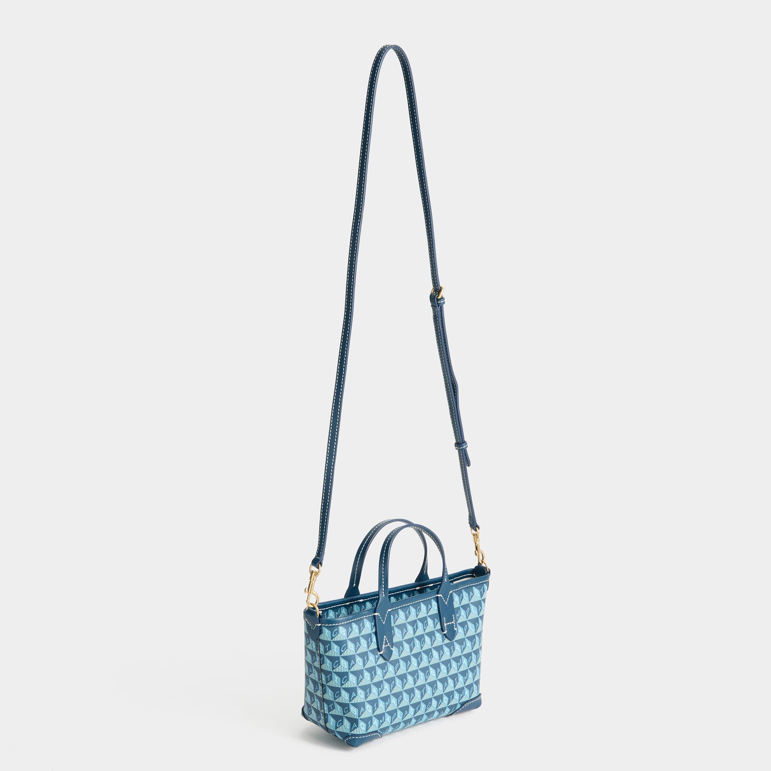 I Am A Plastic Bag Mini Tote -

          
            Recycled canvas/Satin leather in Petrol Blue -
          

          Anya Hindmarch UK
