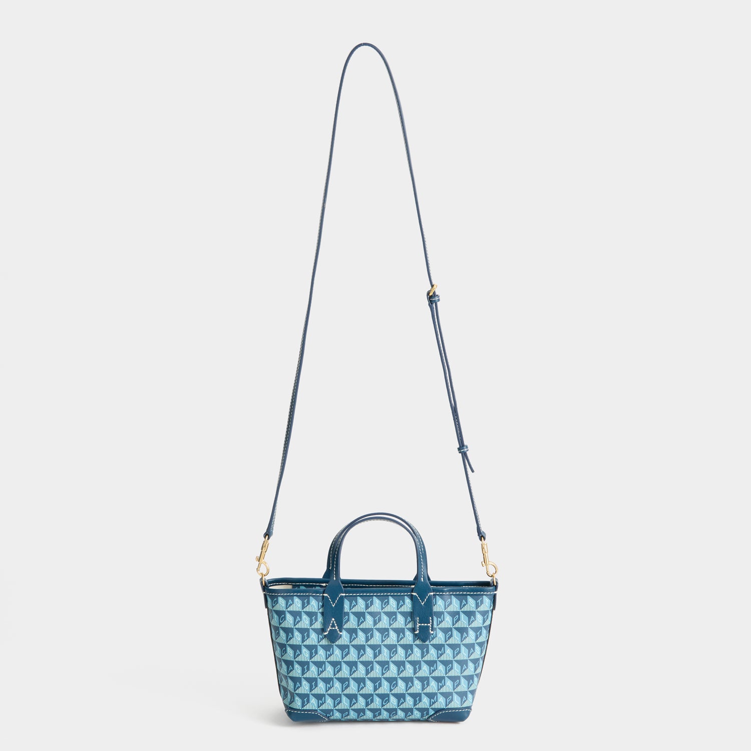 I Am A Plastic Bag Mini Tote -

          
            Recycled canvas/Satin leather in Petrol Blue -
          

          Anya Hindmarch UK

