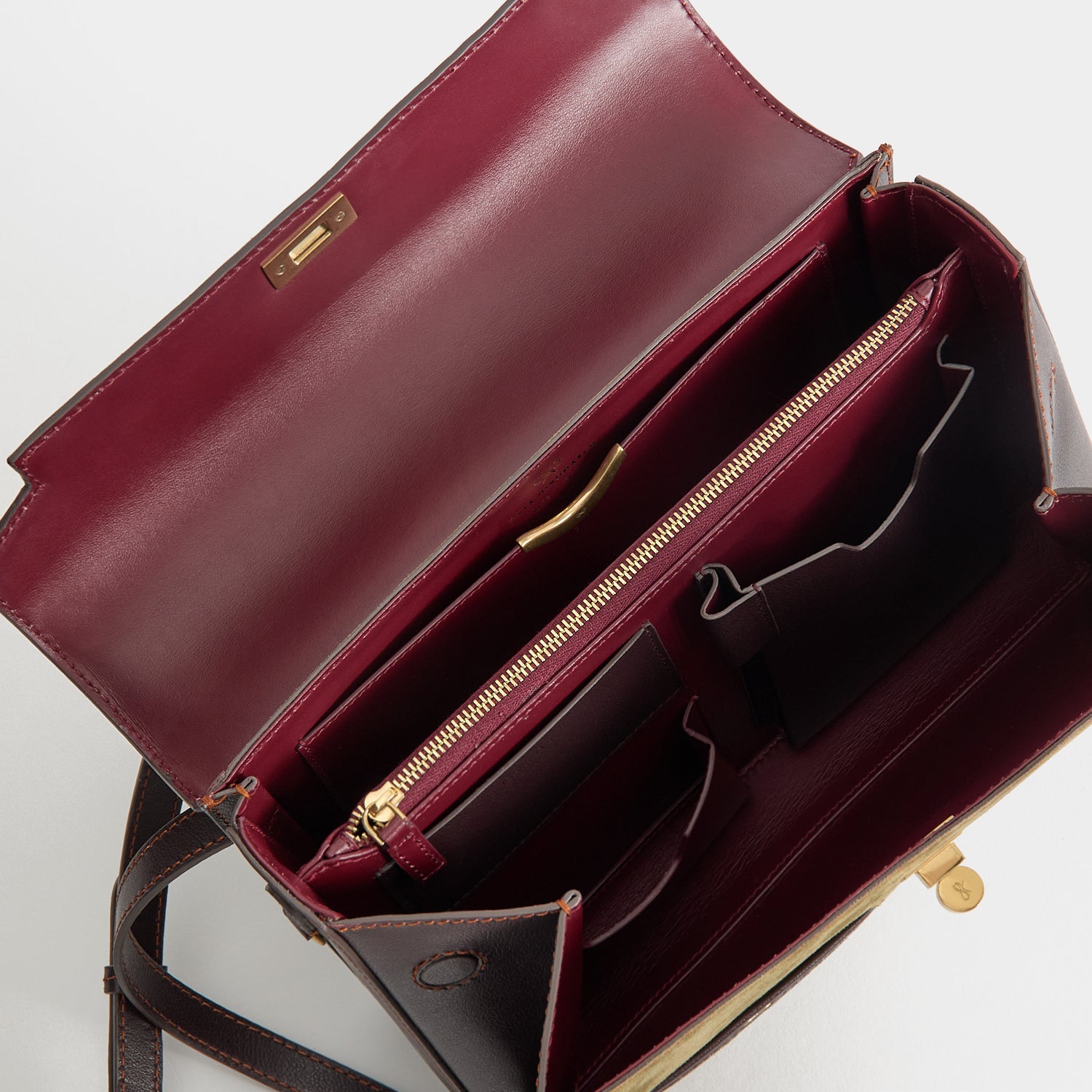 Mortimer Frame Top Handle -

          
            Suede Leather/Calf Leather in Bonsai green and Grape -
          

          Anya Hindmarch UK
