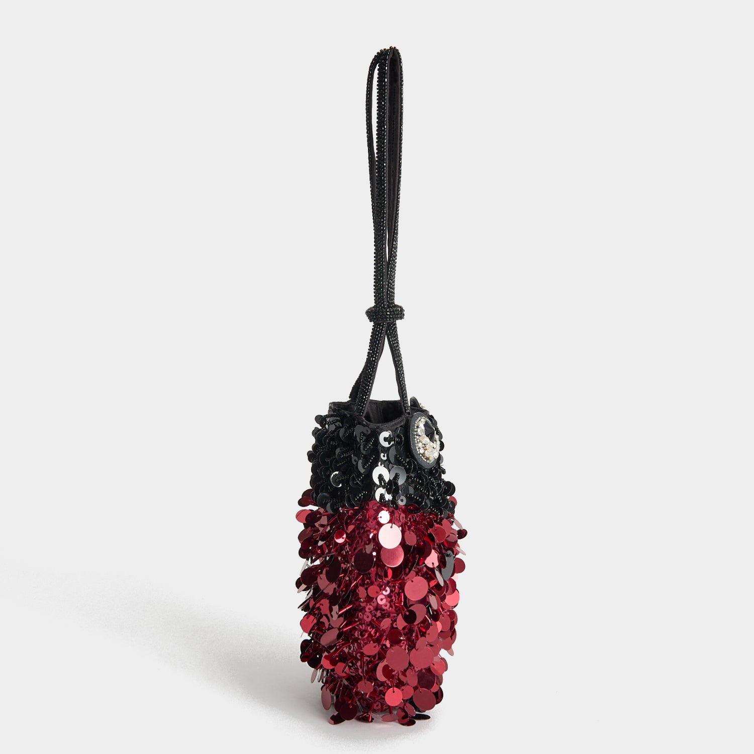 Ladybird Mini Bucket Bag -

          
            Sequins in black and red -
          

          Anya Hindmarch UK
