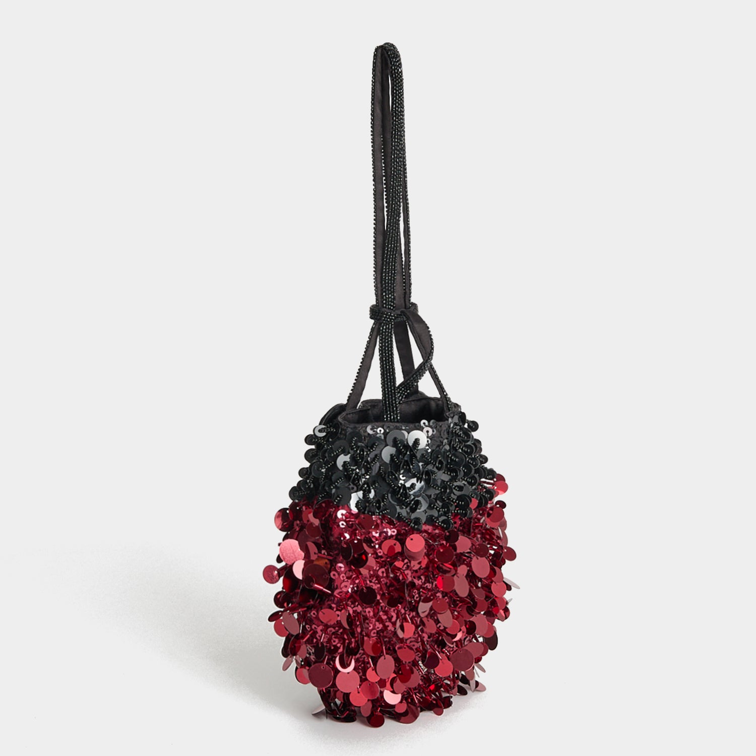 Ladybird Mini Bucket Bag -

          
            Sequins in black and red -
          

          Anya Hindmarch UK

