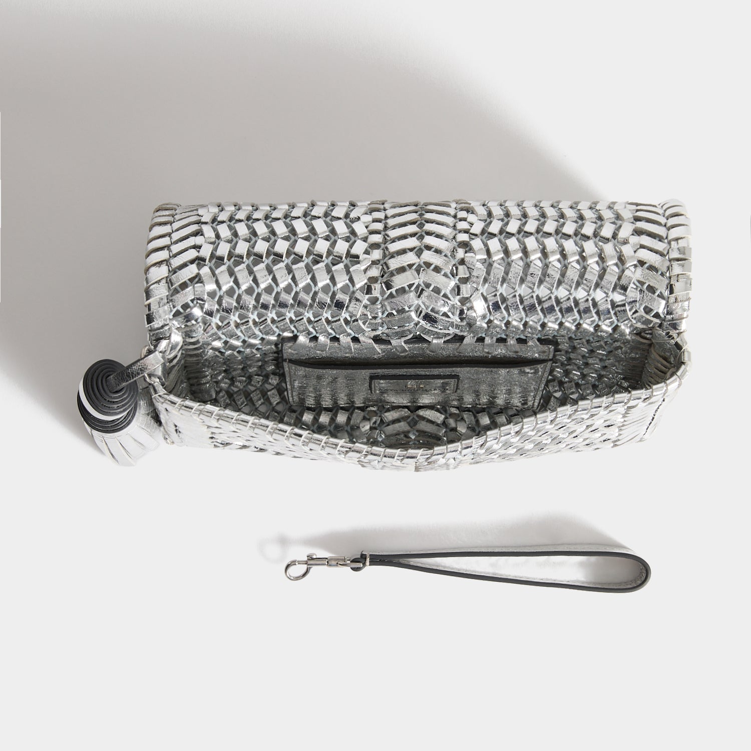 Neeson Tassel Clutch -

          
            Capra Leather in Silver -
          

          Anya Hindmarch UK
