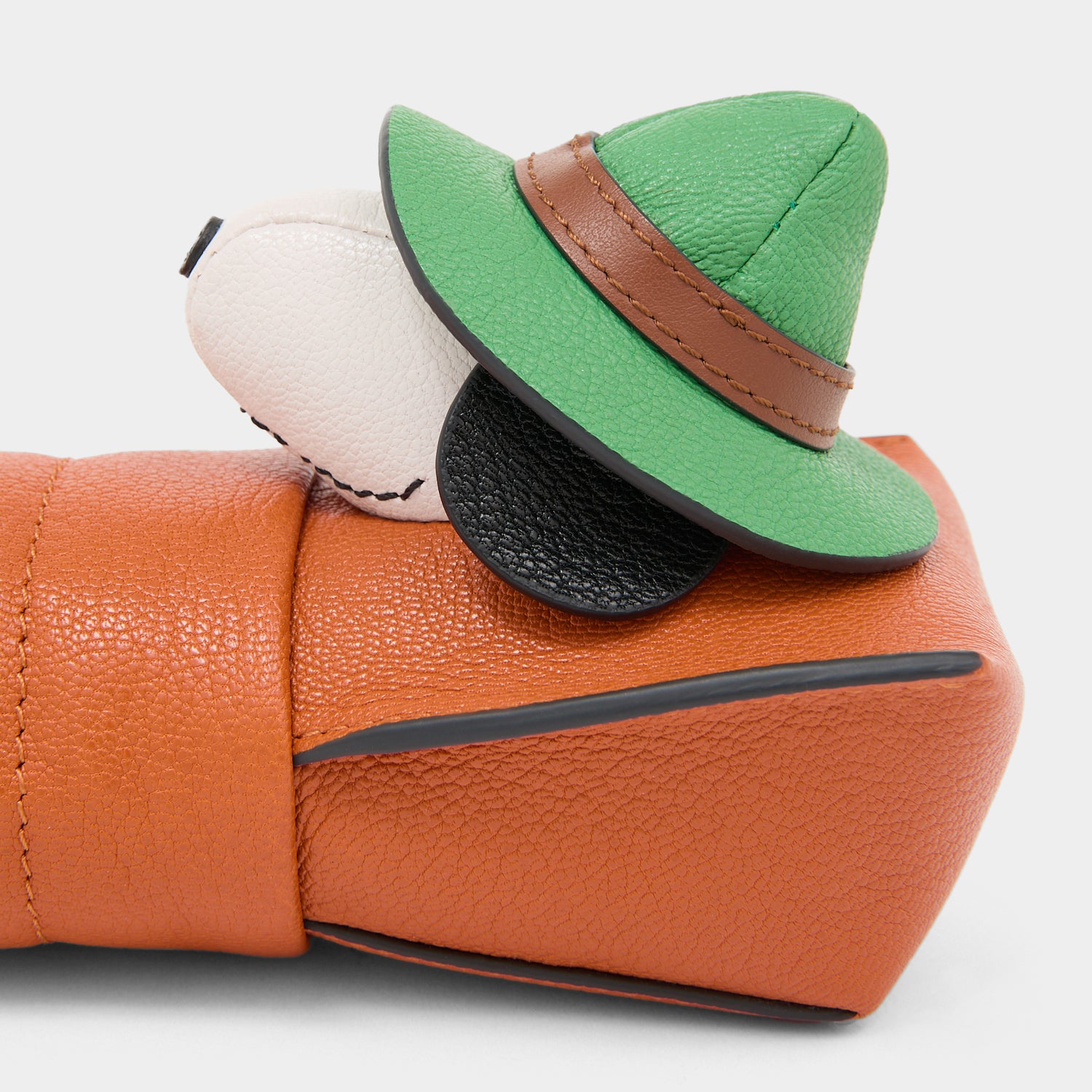 Peanuts Snoopy Pencil Case -

          
            Capra Leather in Dark Clementine Orange -
          

          Anya Hindmarch UK
