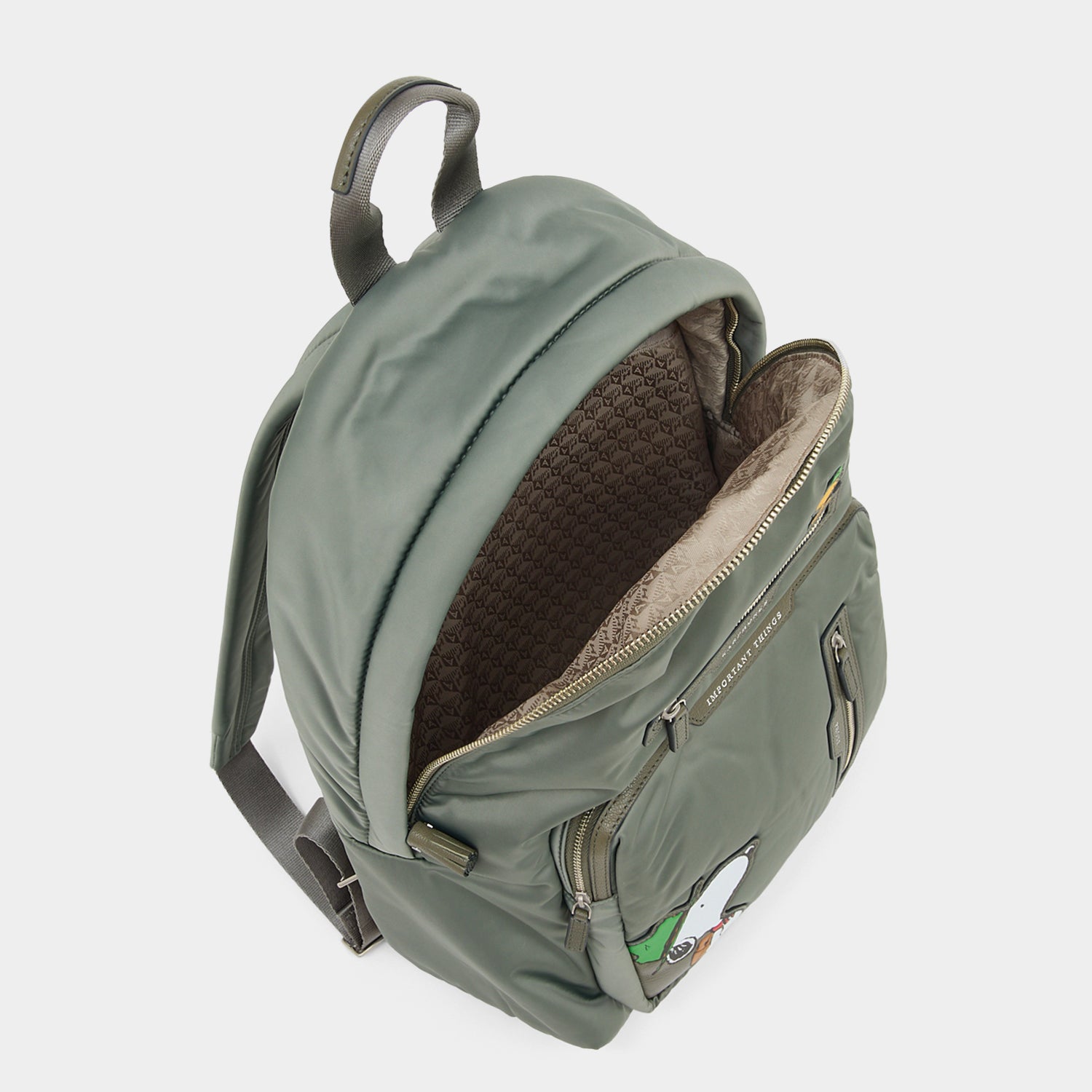 Peanuts Snoopy Backpack -

          
            Recycled padded fabric in Fern Green -
          

          Anya Hindmarch UK
