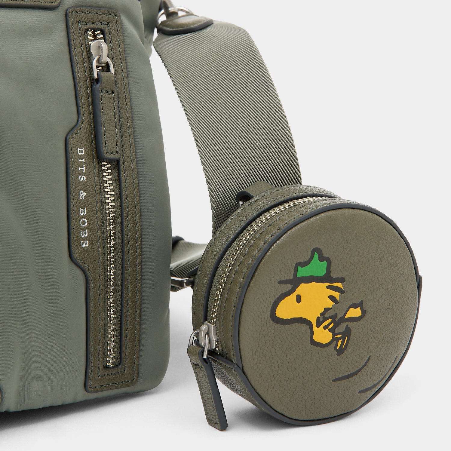 Peanuts Snoopy E/W Mini Tote -

          
            Recycled padded fabric in Fern Green -
          

          Anya Hindmarch UK
