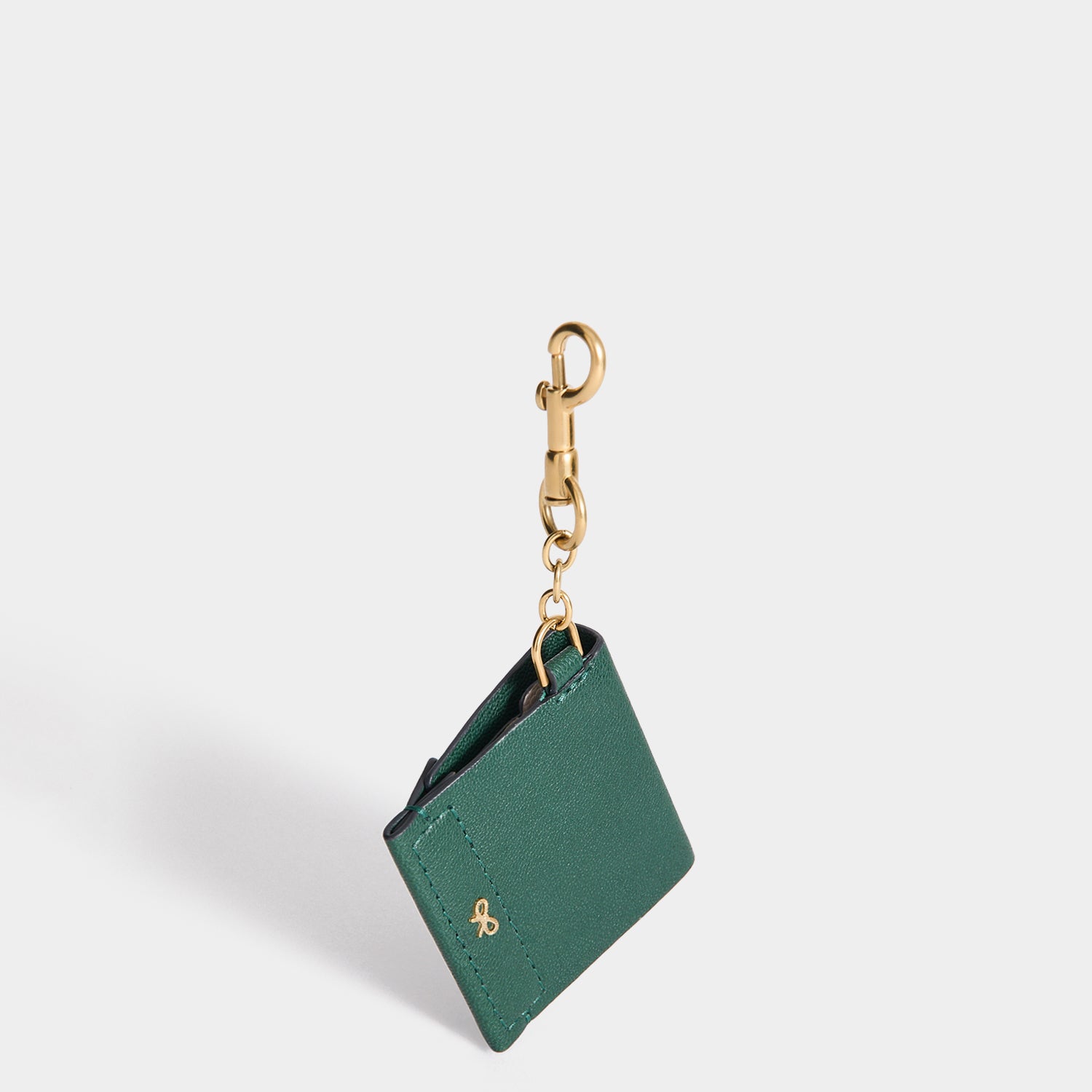 Christmas Charm -

          
            Capra Leather in Dark Green -
          

          Anya Hindmarch UK
