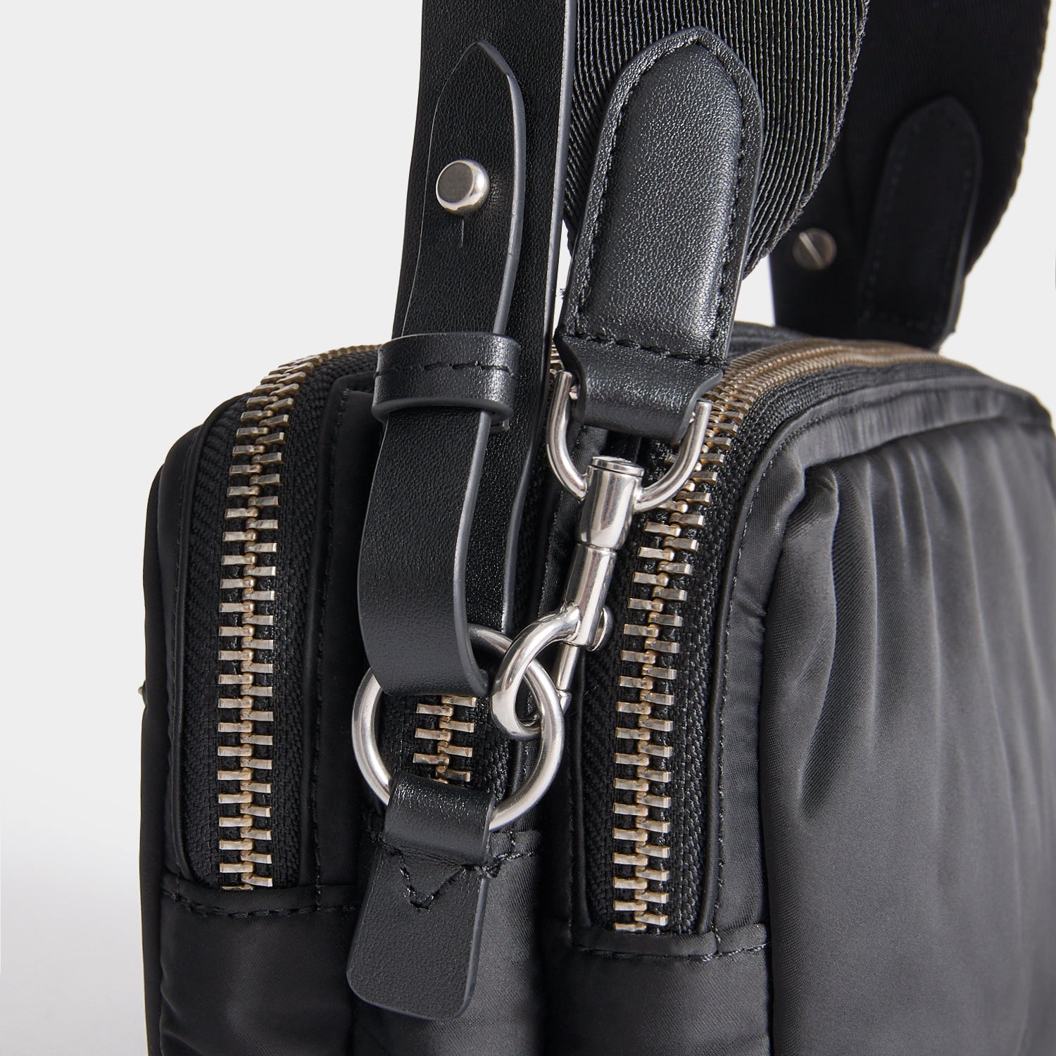 Studs Triple Zip Cross-body -

          
            Recycled Satin/Calf Leather in Black -
          

          Anya Hindmarch UK

