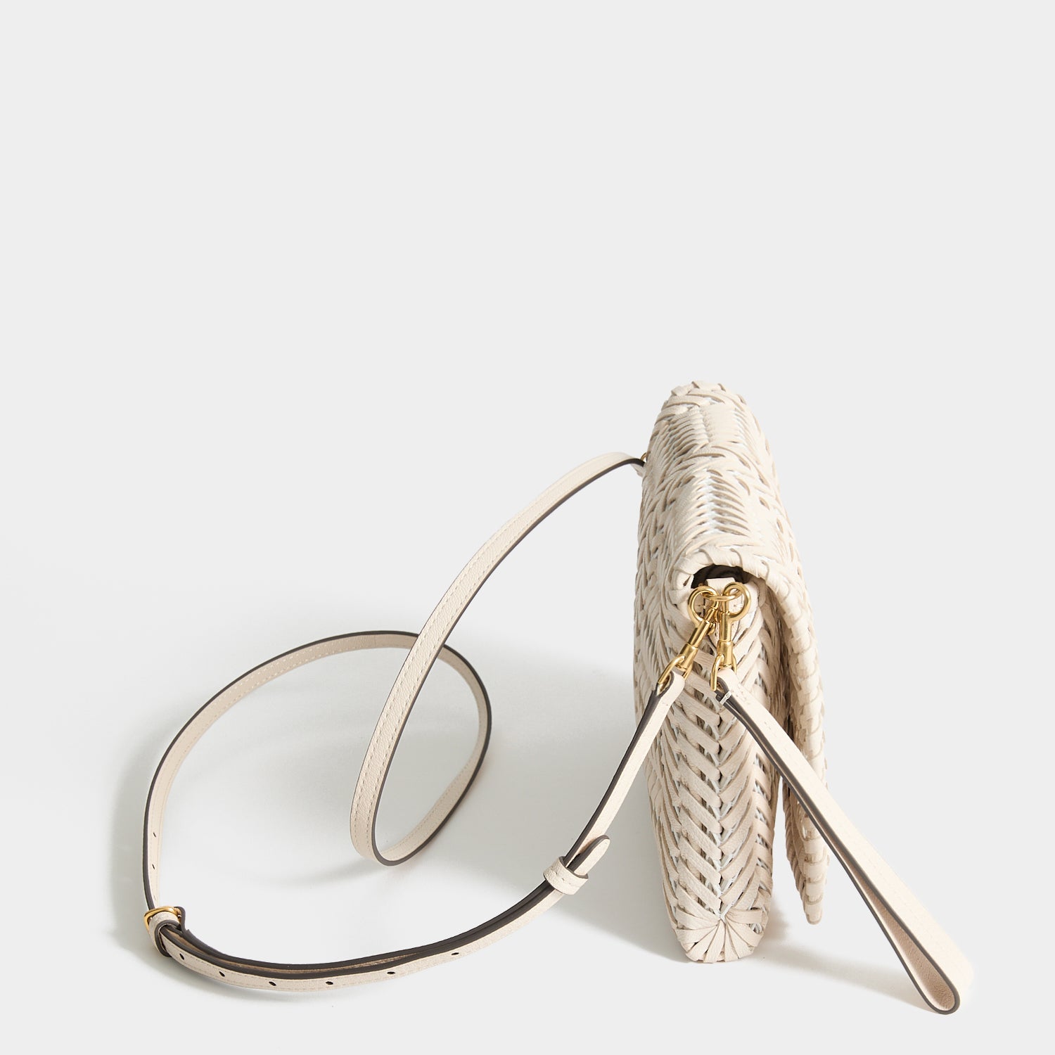 Neeson Cross-body -

          
            Capra Leather in Chalk -
          

          Anya Hindmarch UK
