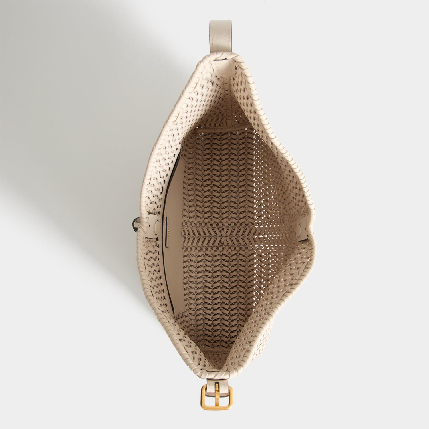 Neeson Tassel Hobo Bag -

          
            Capra Leather in Chalk -
          

          Anya Hindmarch UK
