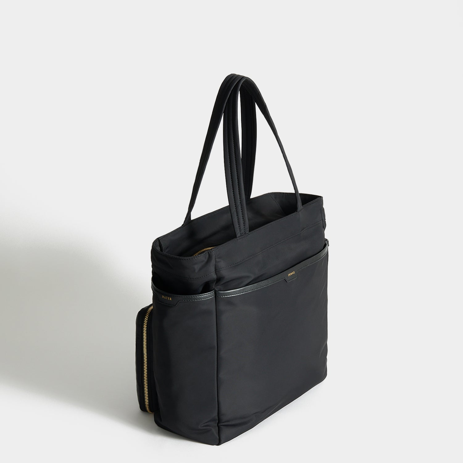 Commuter Tote -

          
            Regenerated Econyl® in Black -
          

          Anya Hindmarch UK
