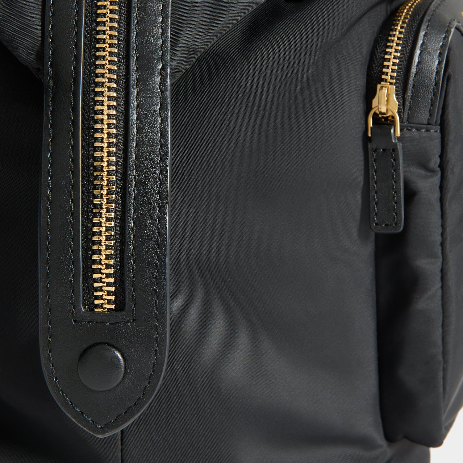 In-Flight Travel Bag -

          
            Regenerated Econyl® in Black -
          

          Anya Hindmarch UK
