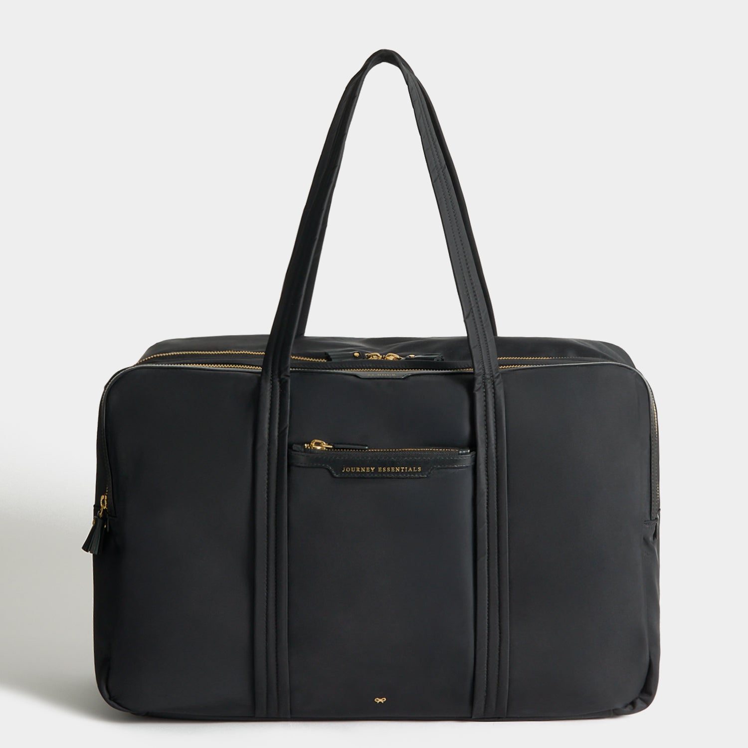 24 Hour Travel Bag -

          
            Regenerated ECONYL® in Black -
          

          Anya Hindmarch UK
