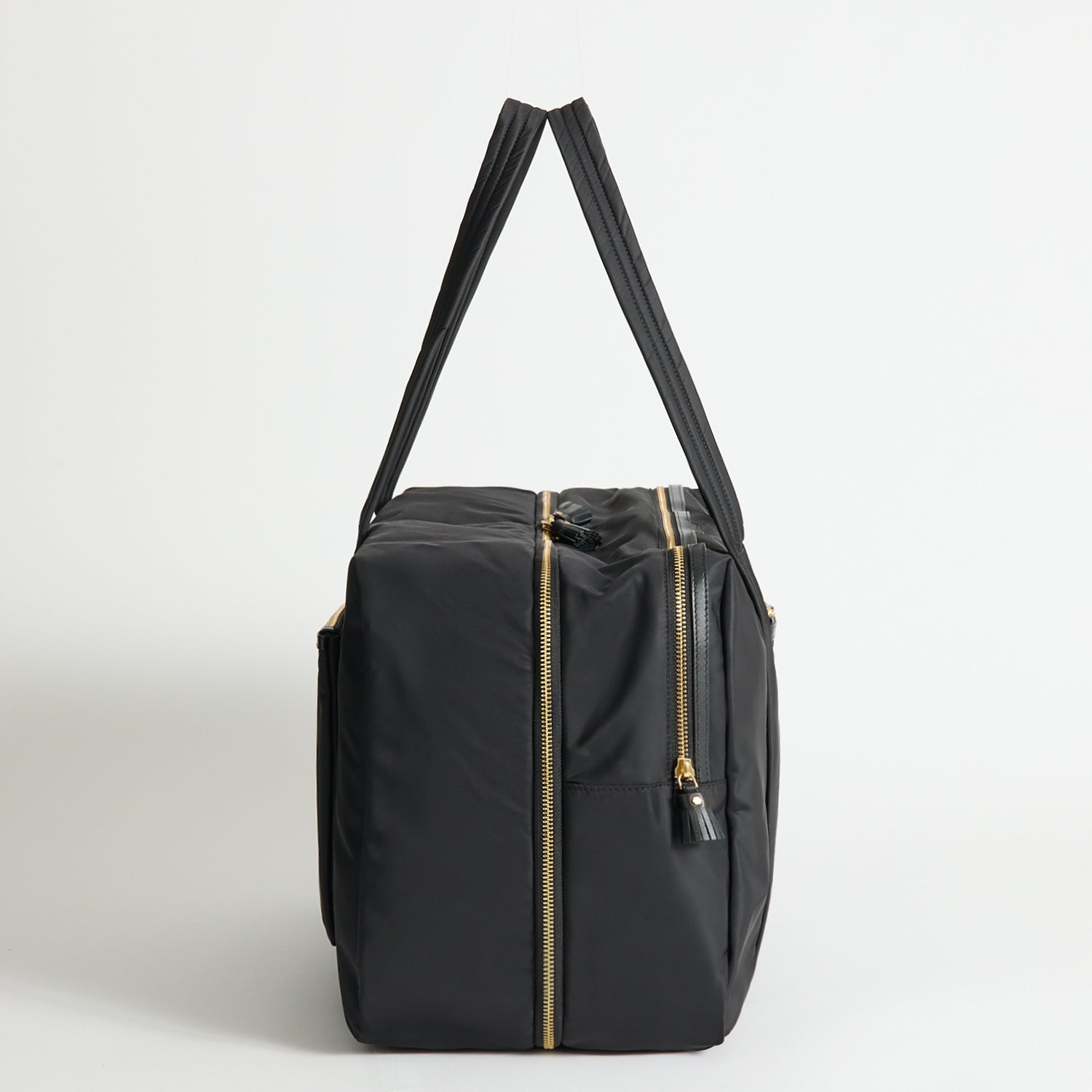 24 Hour Travel Bag -

          
            Regenerated ECONYL® in Black -
          

          Anya Hindmarch UK
