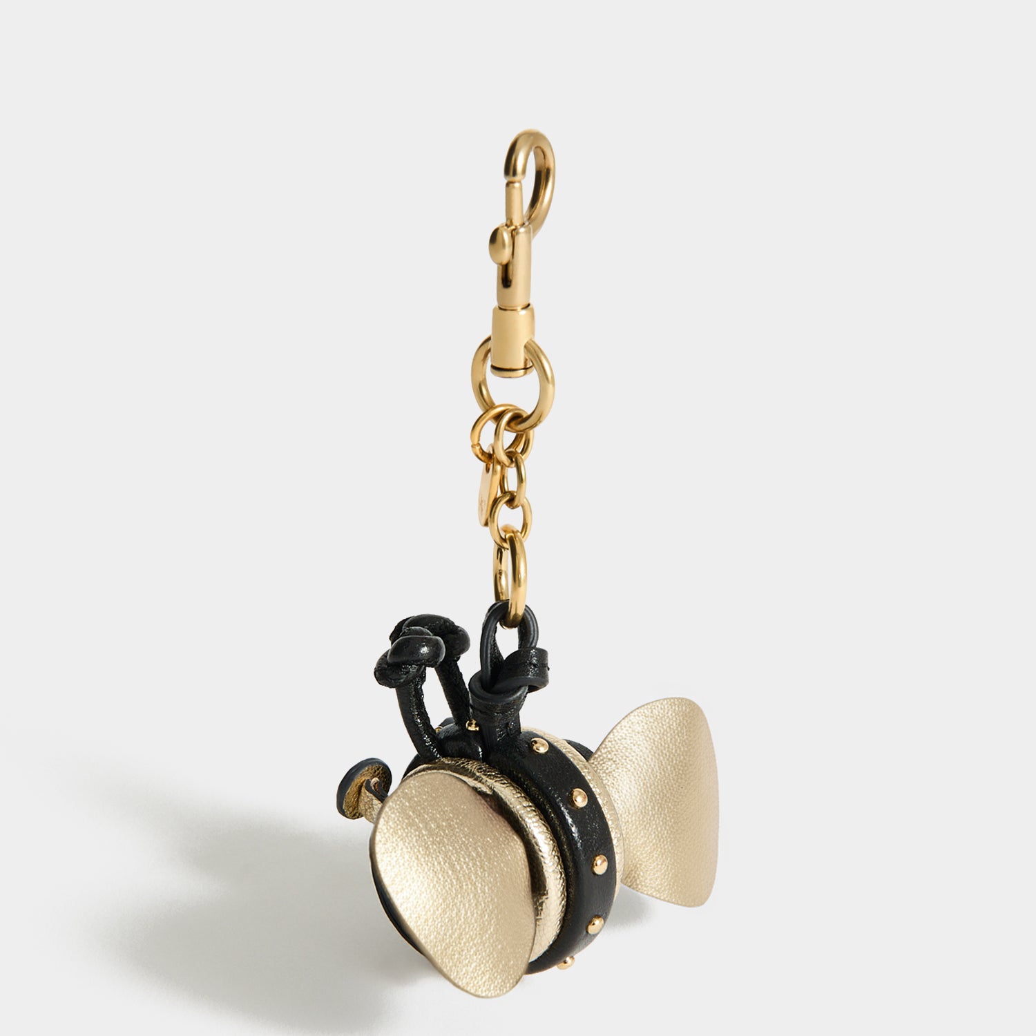 Bee Charm -

          
            Capra Leather in black -
          

          Anya Hindmarch UK
